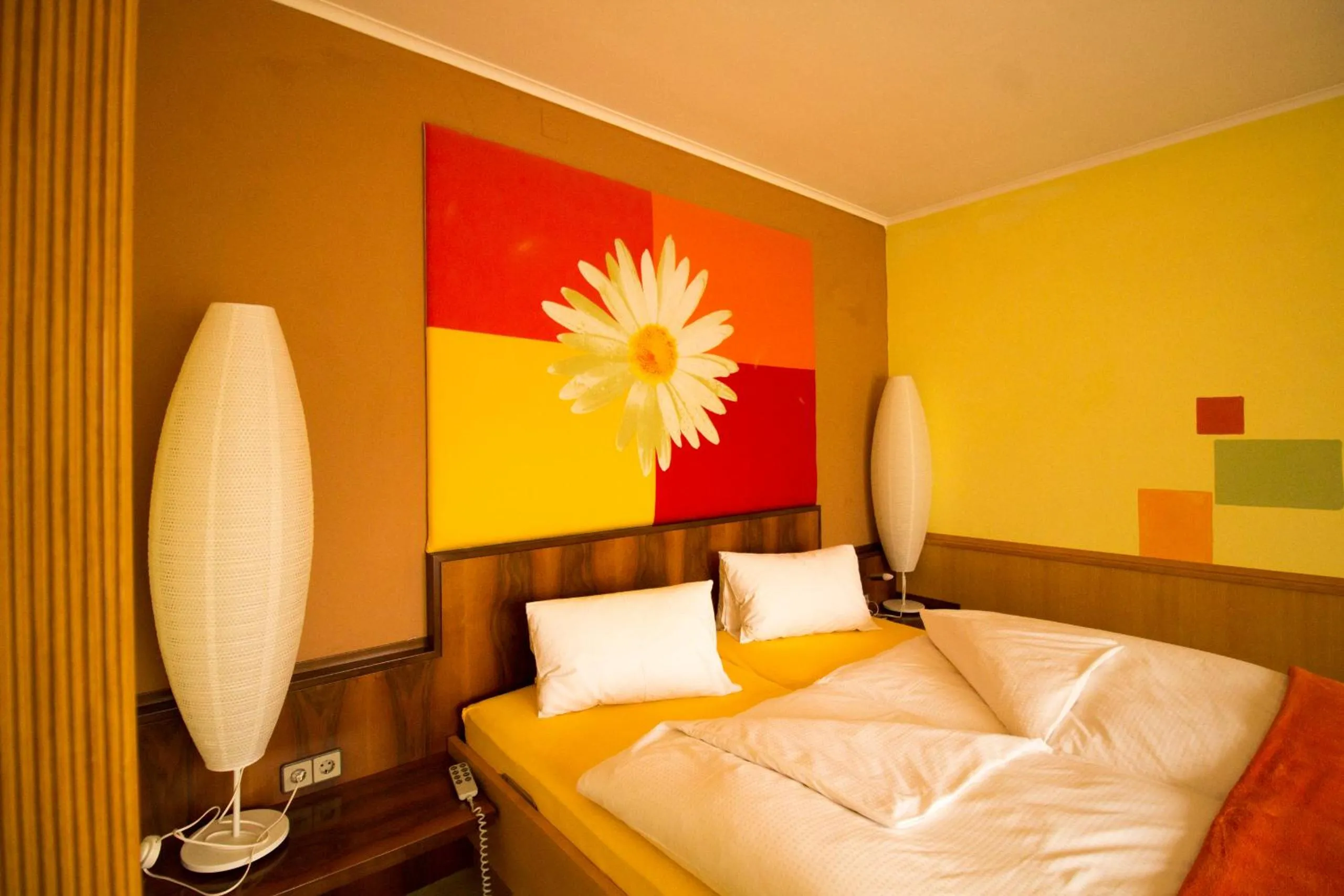 Decorative detail, Bed in Malerwinkl Restaurant + Kunsthotel