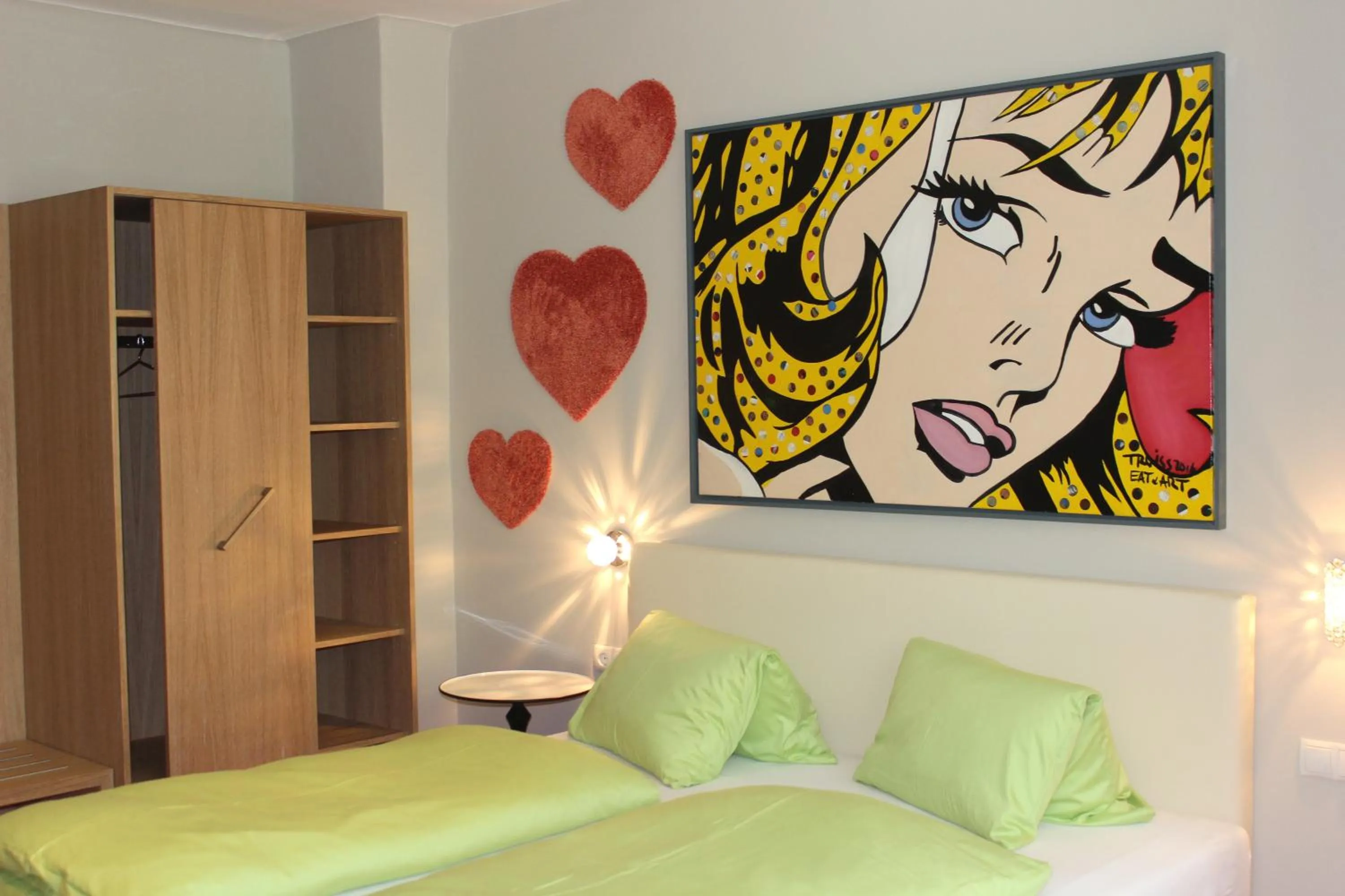 Decorative detail, Bed in Malerwinkl Restaurant + Kunsthotel