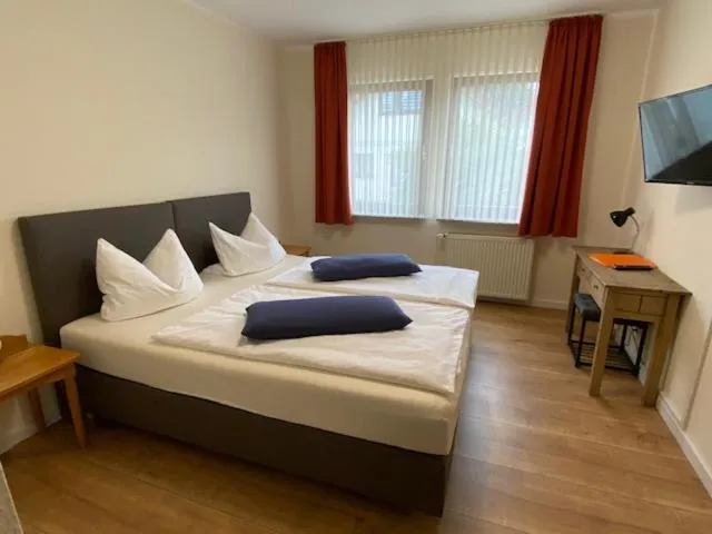 Bed in Hotel Janssen