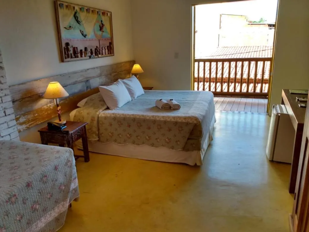 Bed in Pousada Rosa dos Ventos