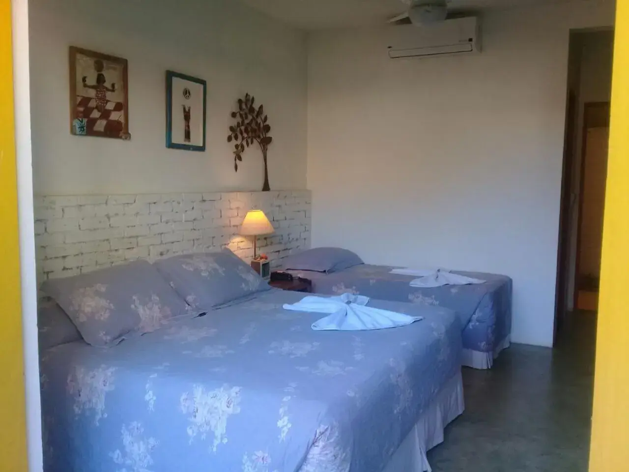 Triple Room with Balcony in Pousada Rosa dos Ventos Triple Room with Balcony in Pousada Rosa dos Ventos