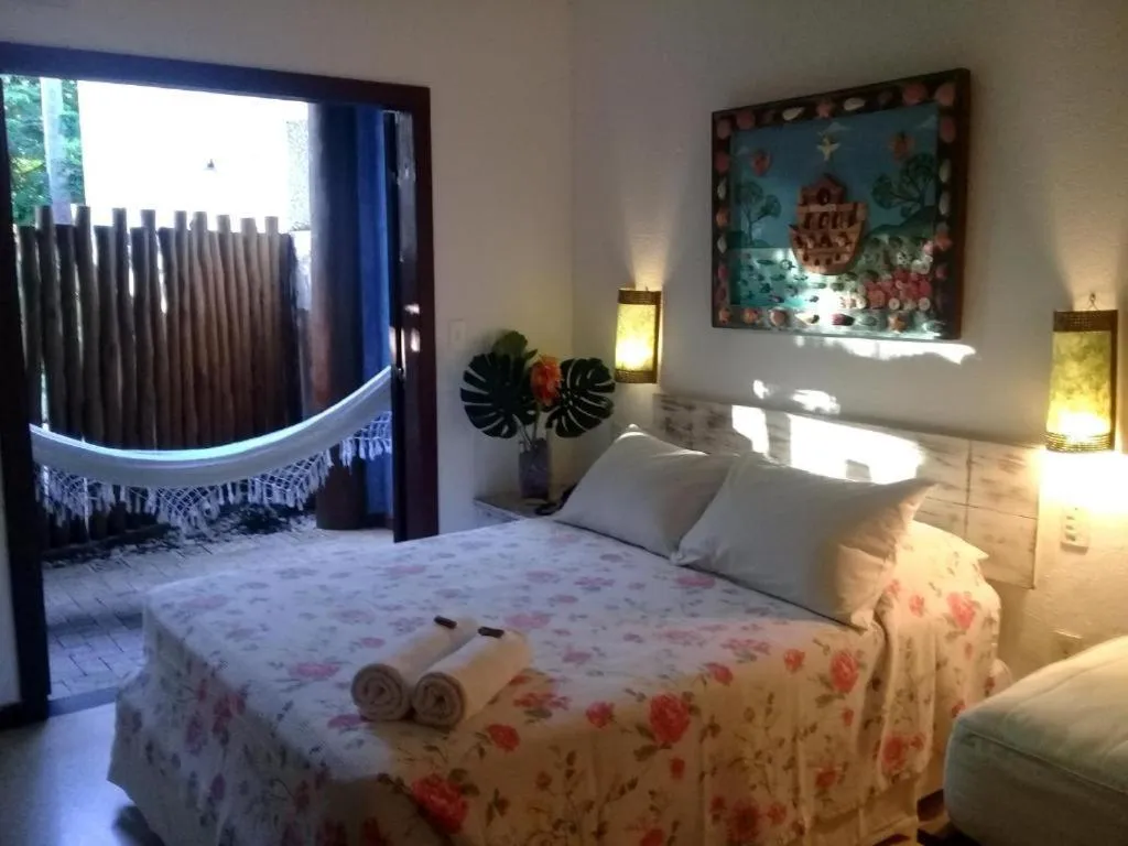 Bed in Pousada Rosa dos Ventos