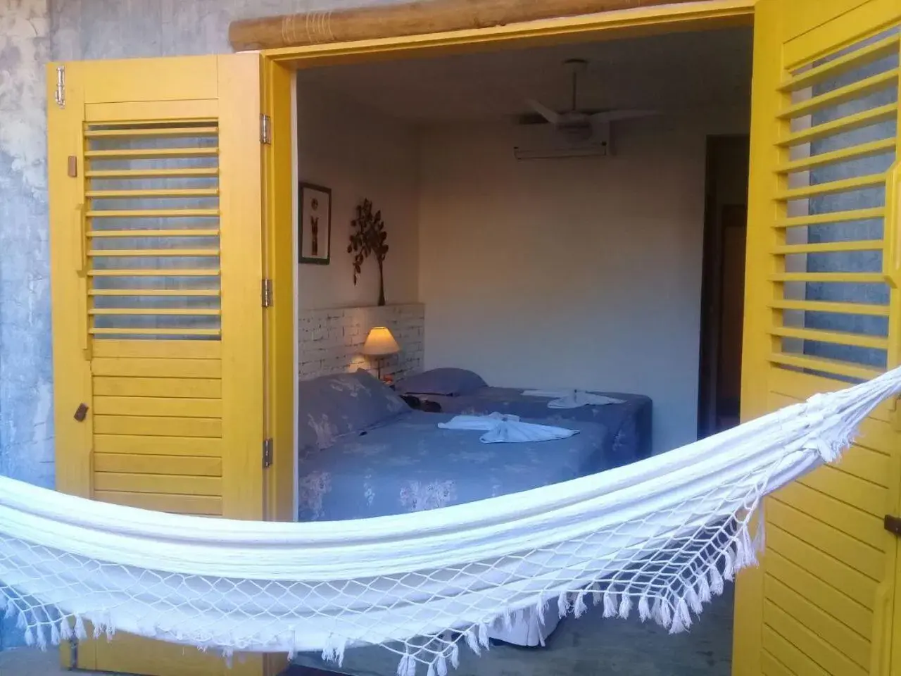 Triple Room with Balcony in Pousada Rosa dos Ventos Triple Room with Balcony in Pousada Rosa dos Ventos