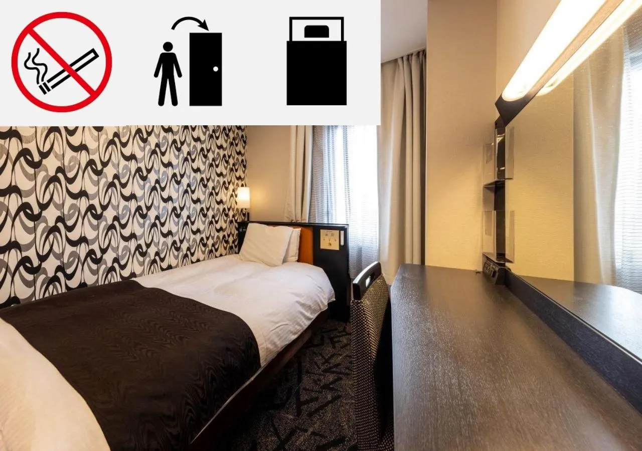 Bed in APA Hotel Kanazawa Katamachi