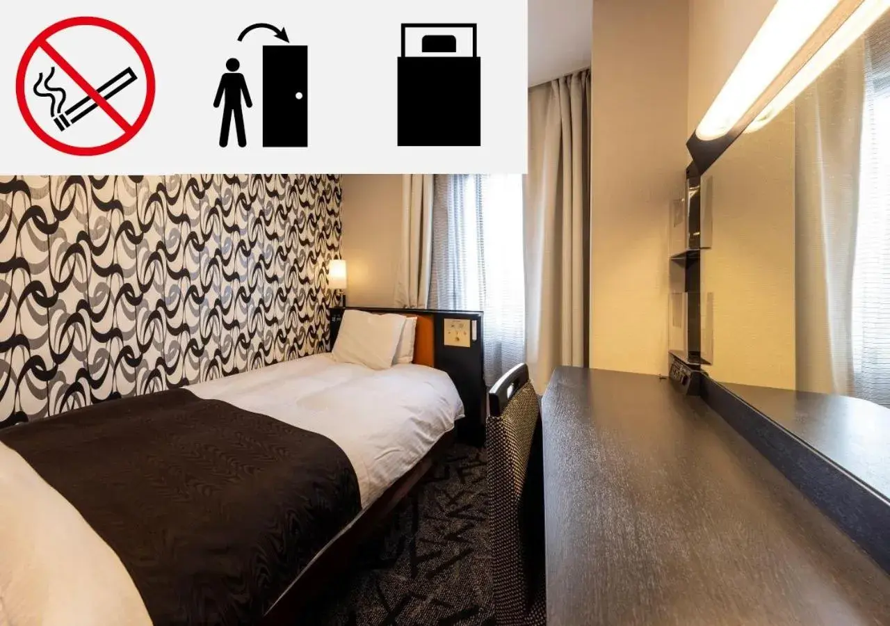 Bed in APA Hotel Kanazawa Katamachi Bed in APA Hotel Kanazawa Katamachi