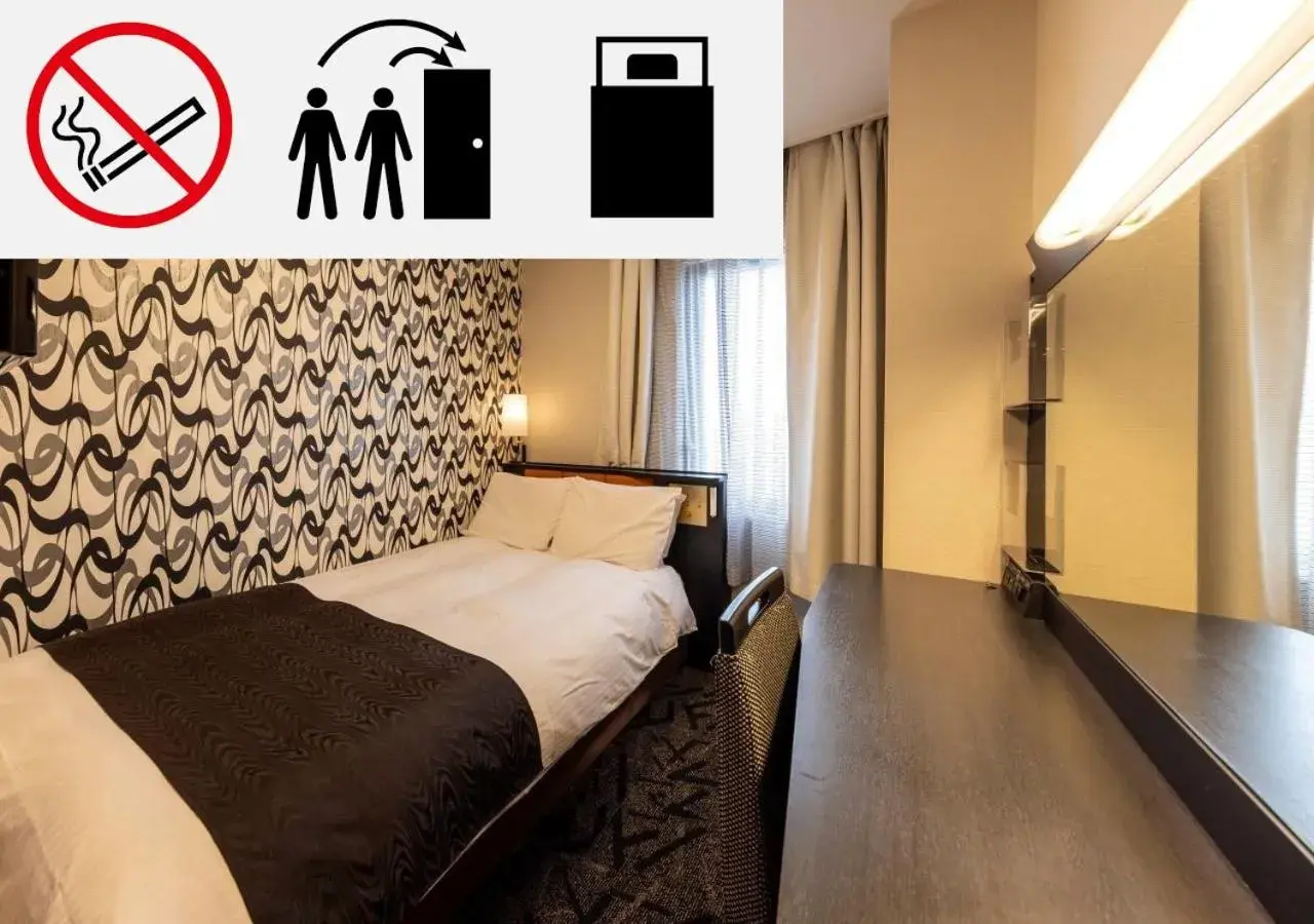 Bed in APA Hotel Kanazawa Katamachi Bed in APA Hotel Kanazawa Katamachi