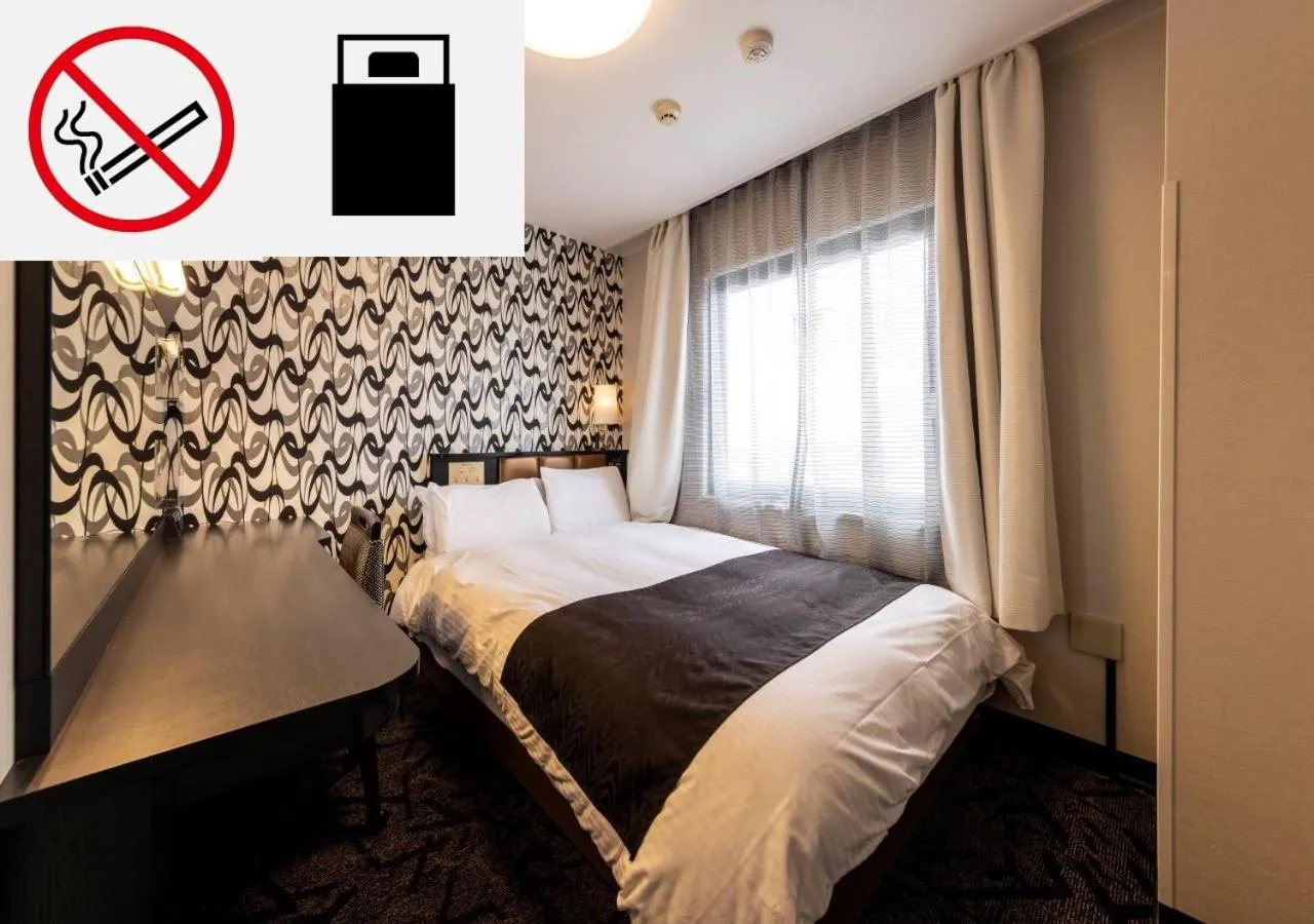 Bed in APA Hotel Kanazawa Katamachi