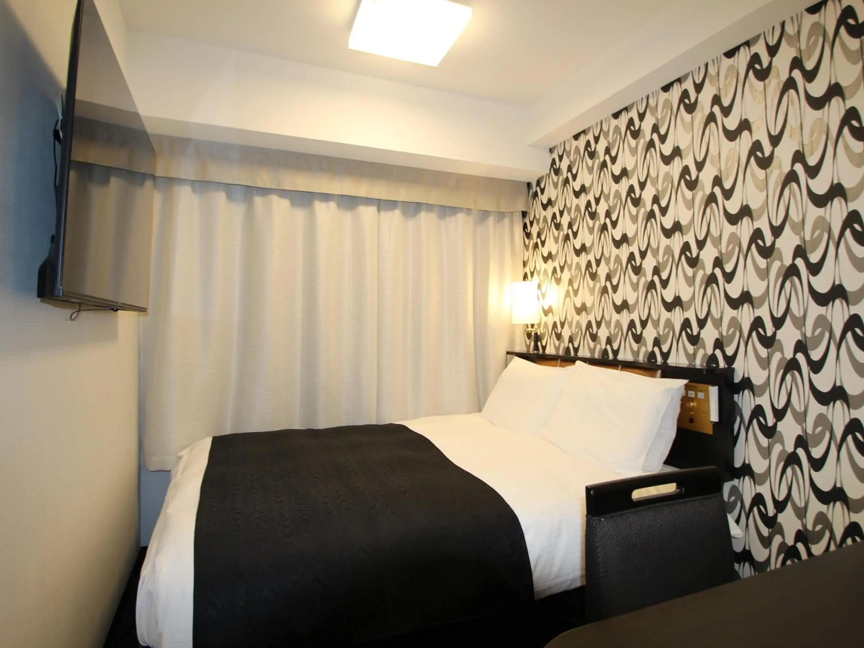 Photo of the whole room, Bed in APA Hotel Toyama Ekimae Photo of the whole room, Bed in APA Hotel Toyama Ekimae