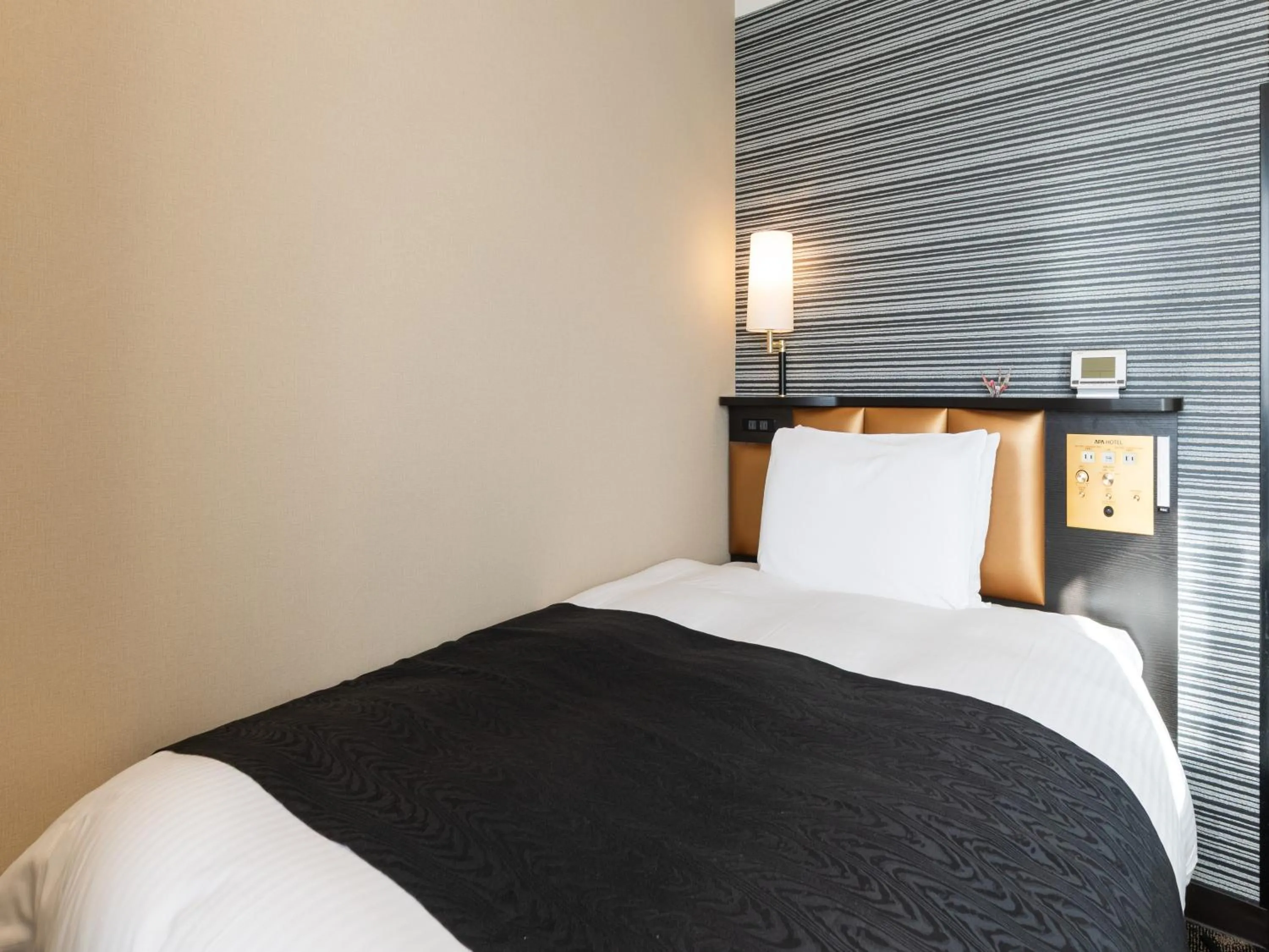 Photo of the whole room, Bed in APA Hotel Toyama Ekimae