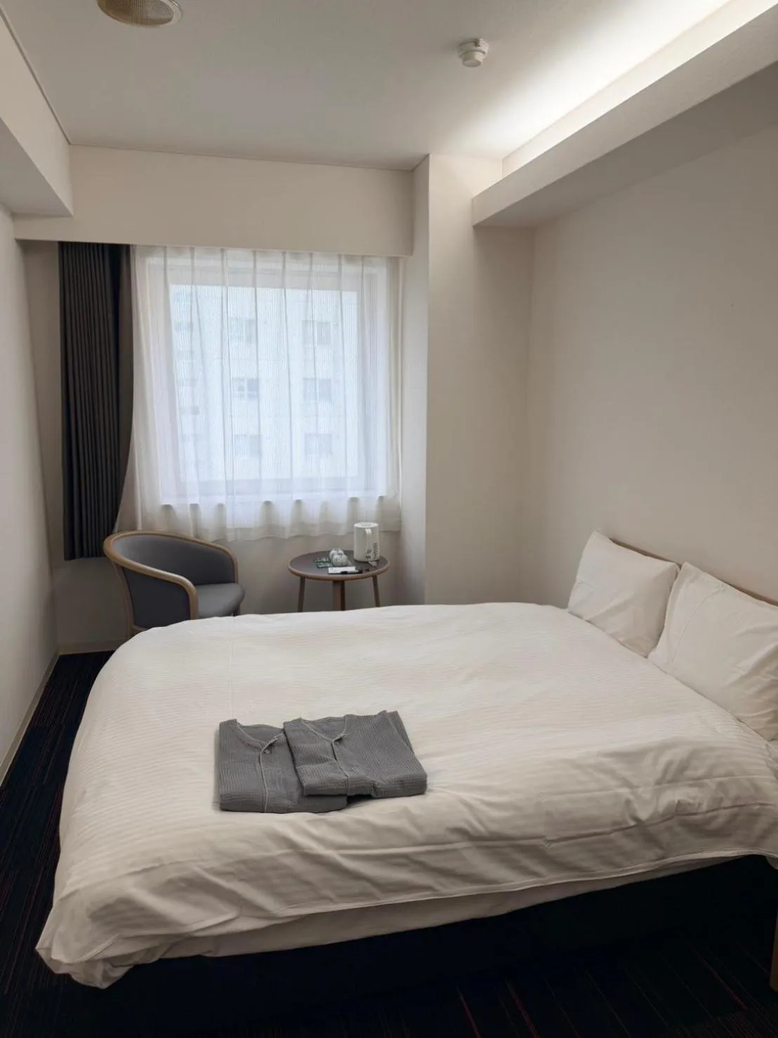 Bed in Hotel Tetora Spirit Sapporo