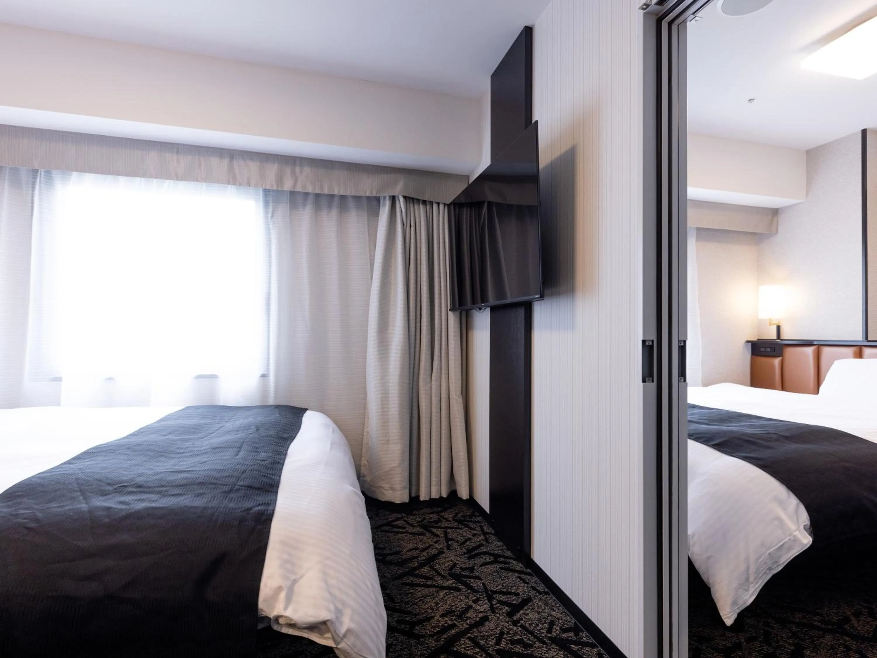 Photo of the whole room, Bed in APA Hotel Nagoya Sakae Ekimae EXCELLENT