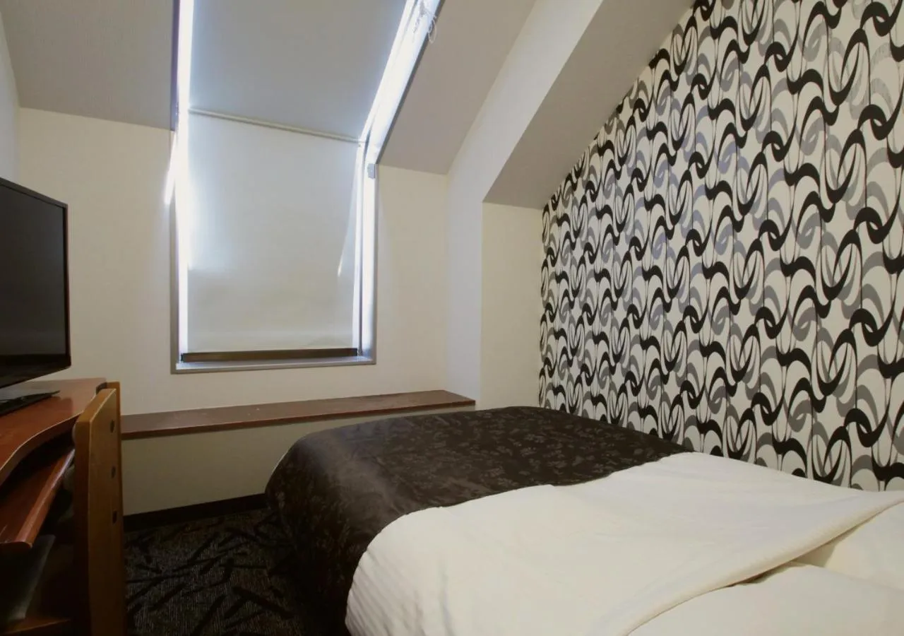 Photo of the whole room, Bed in APA Hotel Kanazawa Nomachi