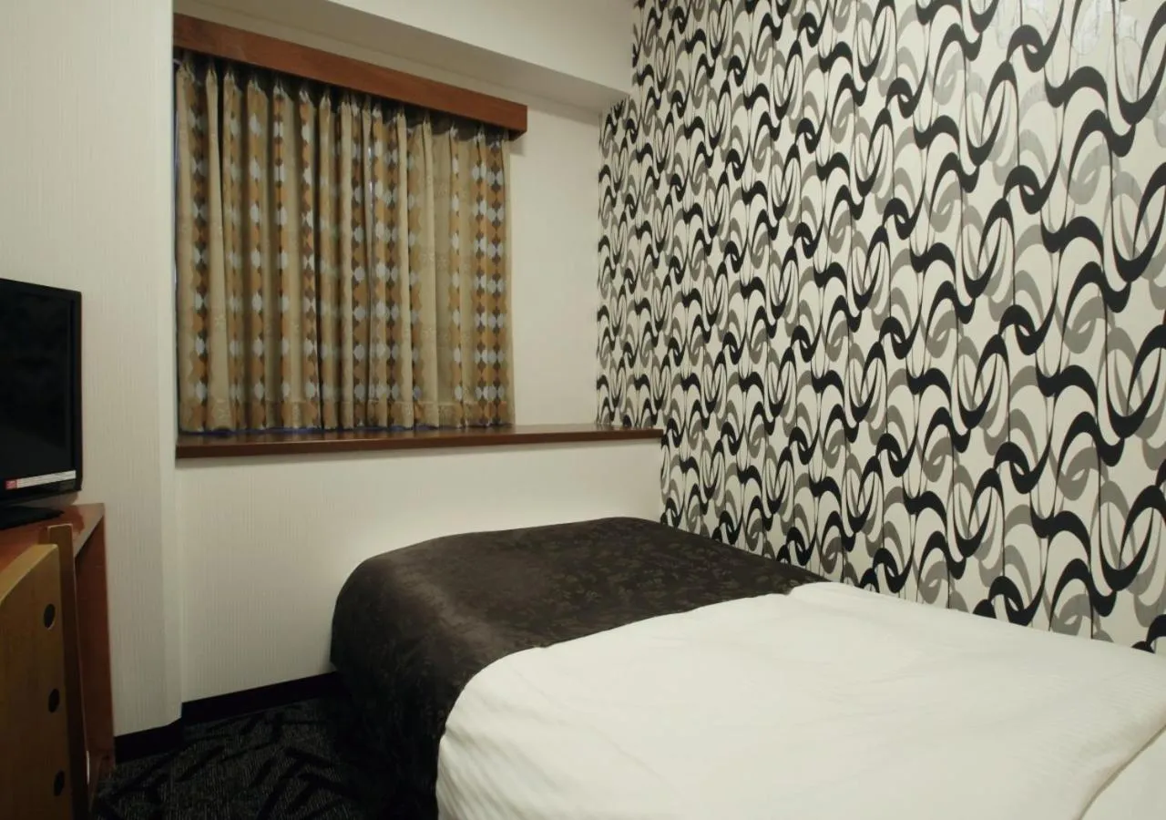 Photo of the whole room, Bed in APA Hotel Kanazawa Nomachi