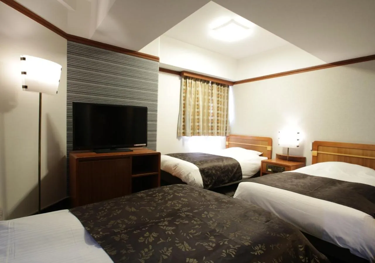 Photo of the whole room, Bed in APA Hotel Kanazawa Nomachi