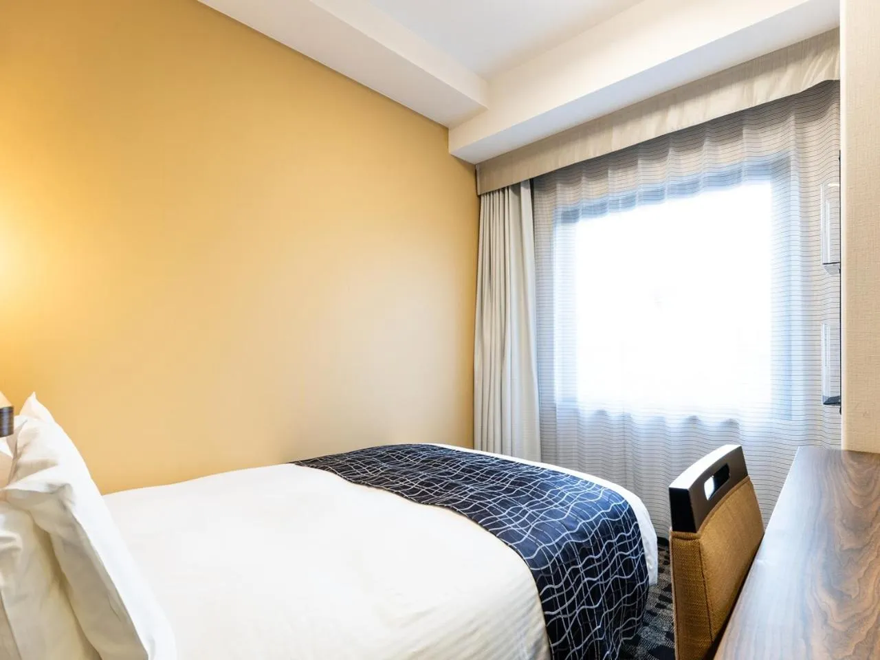 Photo of the whole room, Bed in APA Hotel Toyama Ekimae Minami