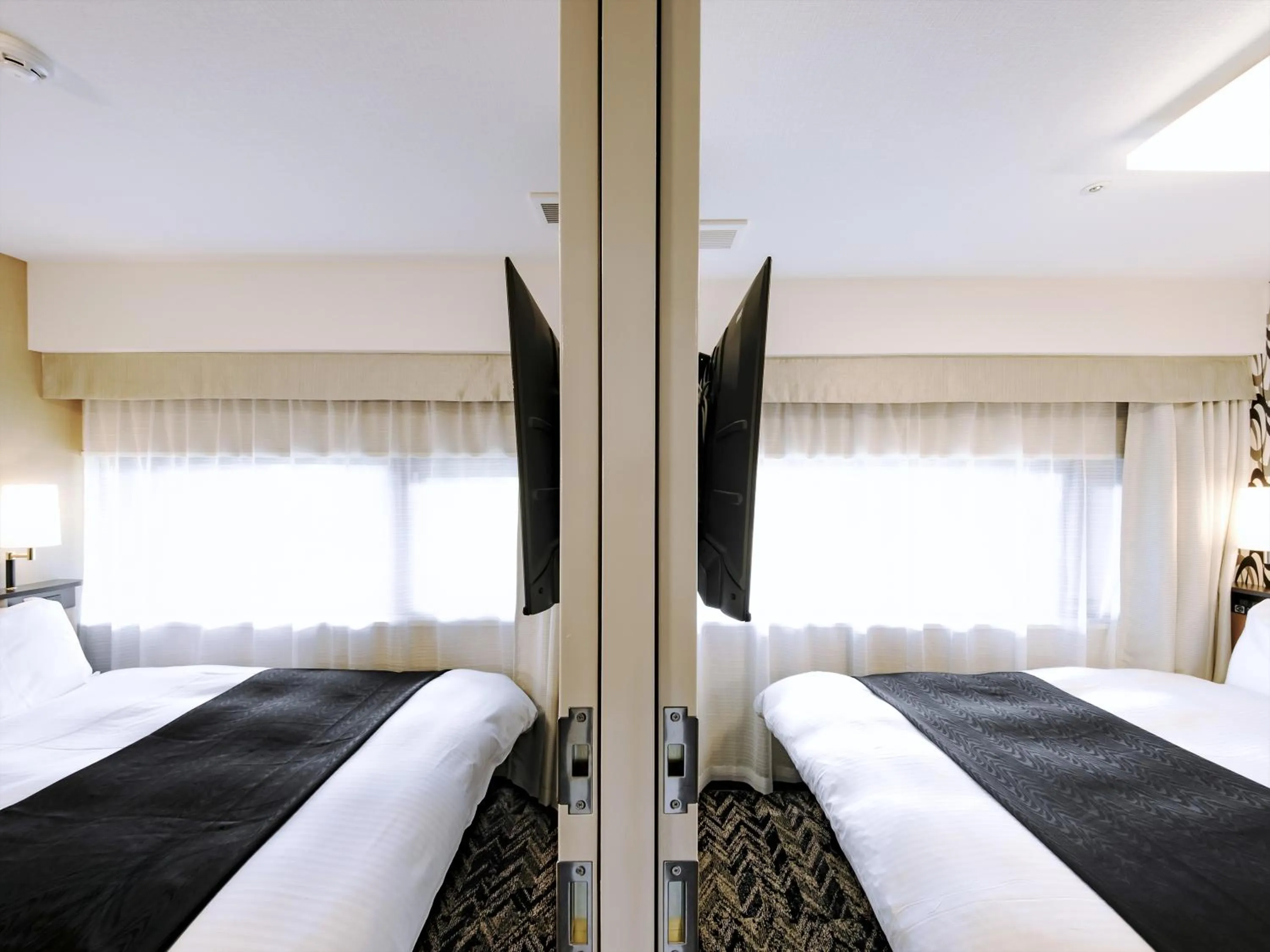 Photo of the whole room, Bed in APA Hotel Tottori Ekimae Minami