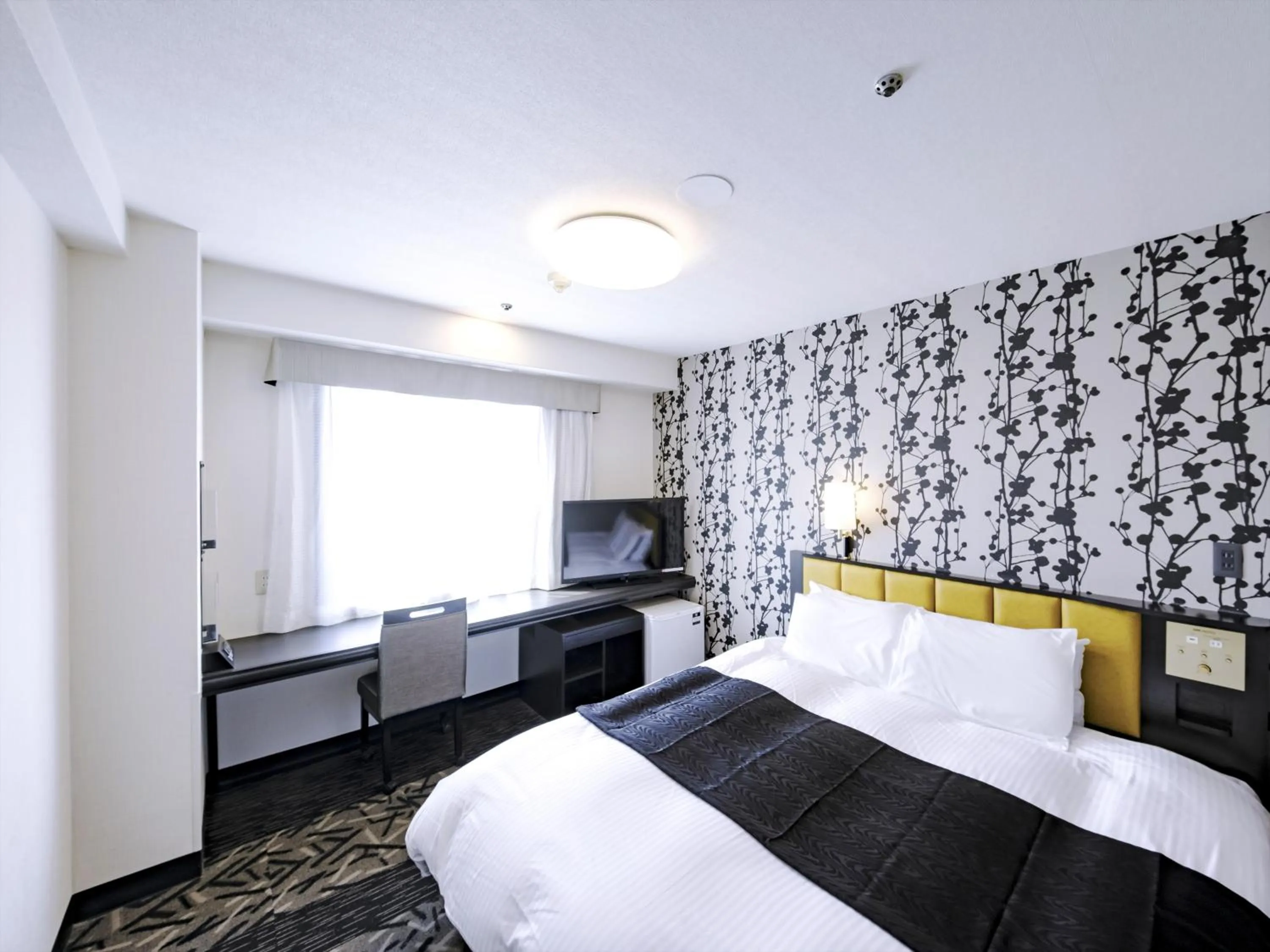 Photo of the whole room, Bed in APA Hotel Tottori Ekimae Minami