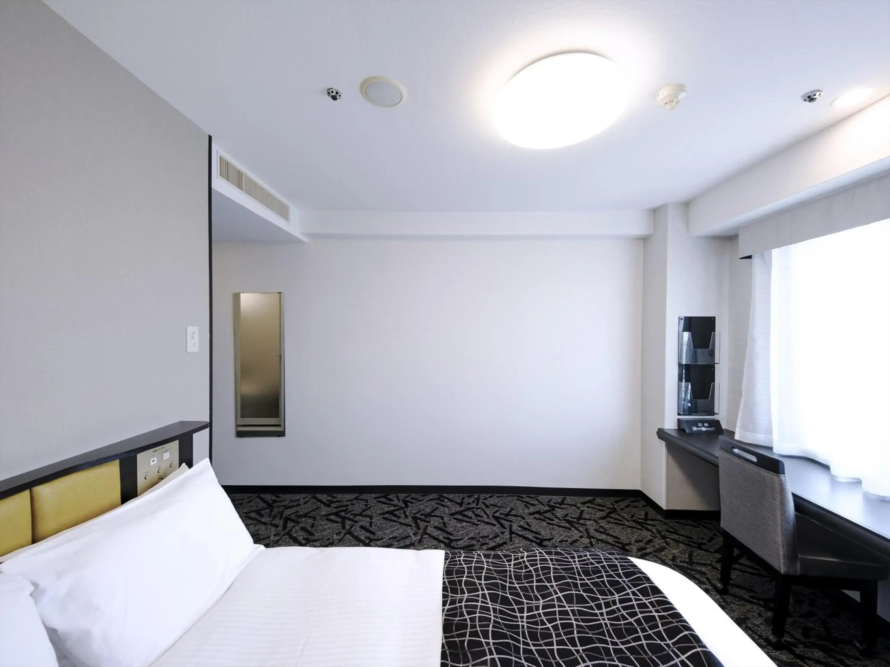 Photo of the whole room, Bed in APA Hotel Tottori Ekimae Minami Photo of the whole room, Bed in APA Hotel Tottori Ekimae Minami