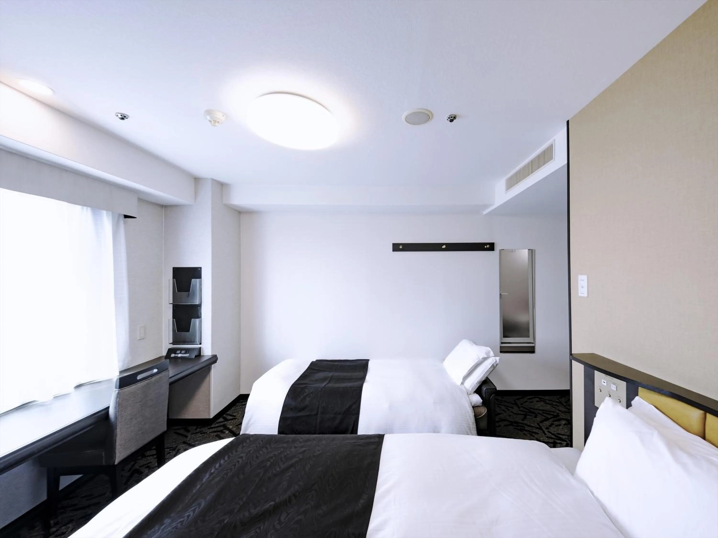 Photo of the whole room, Bed in APA Hotel Tottori Ekimae Minami