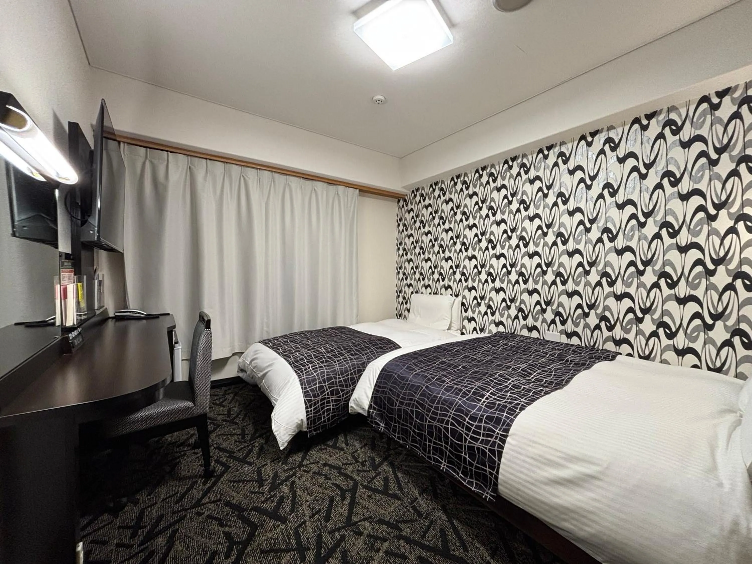 Bed in APA Hotel Kitakami Ekinishi