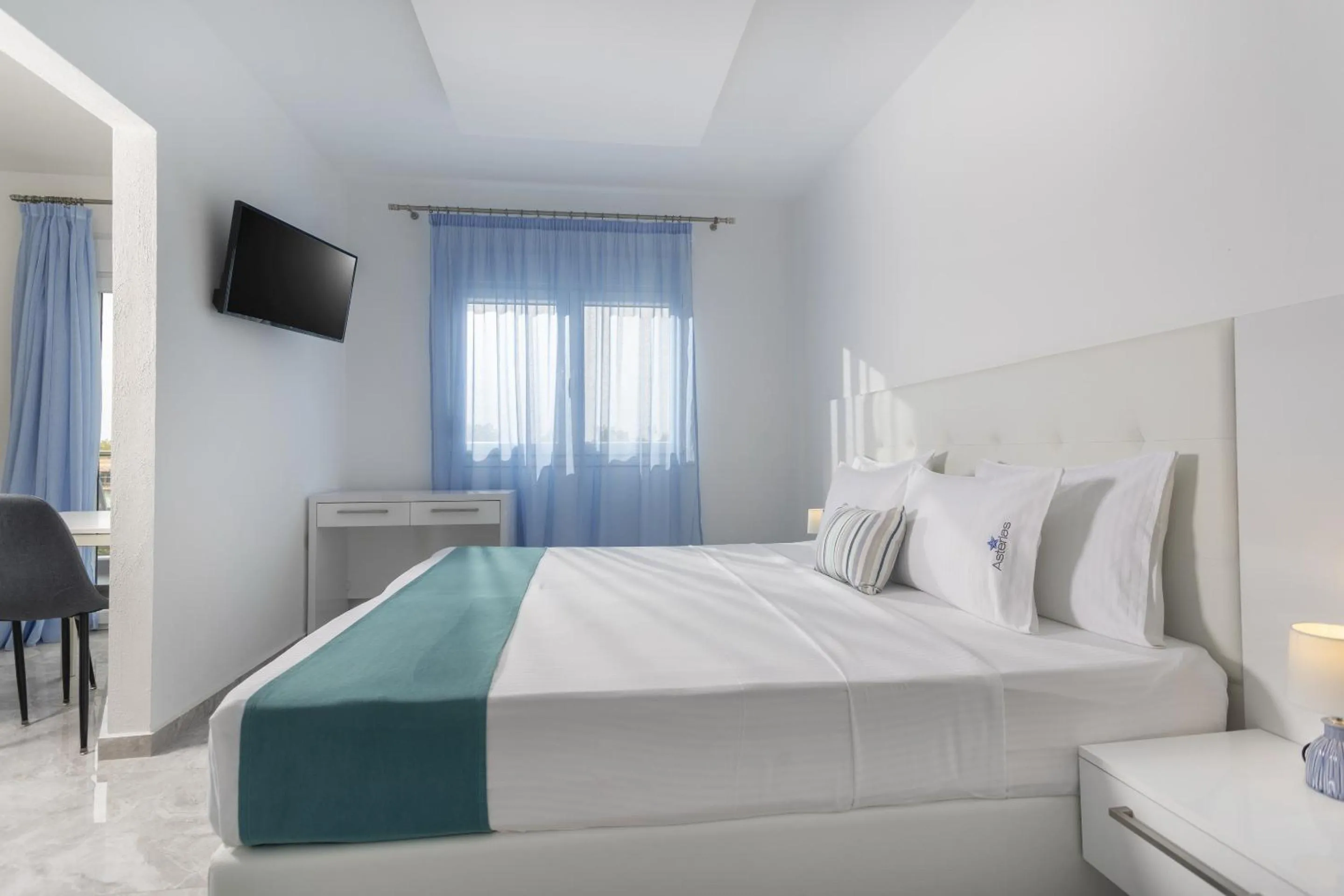 Bed in Asterias Premium Holiday Apartments