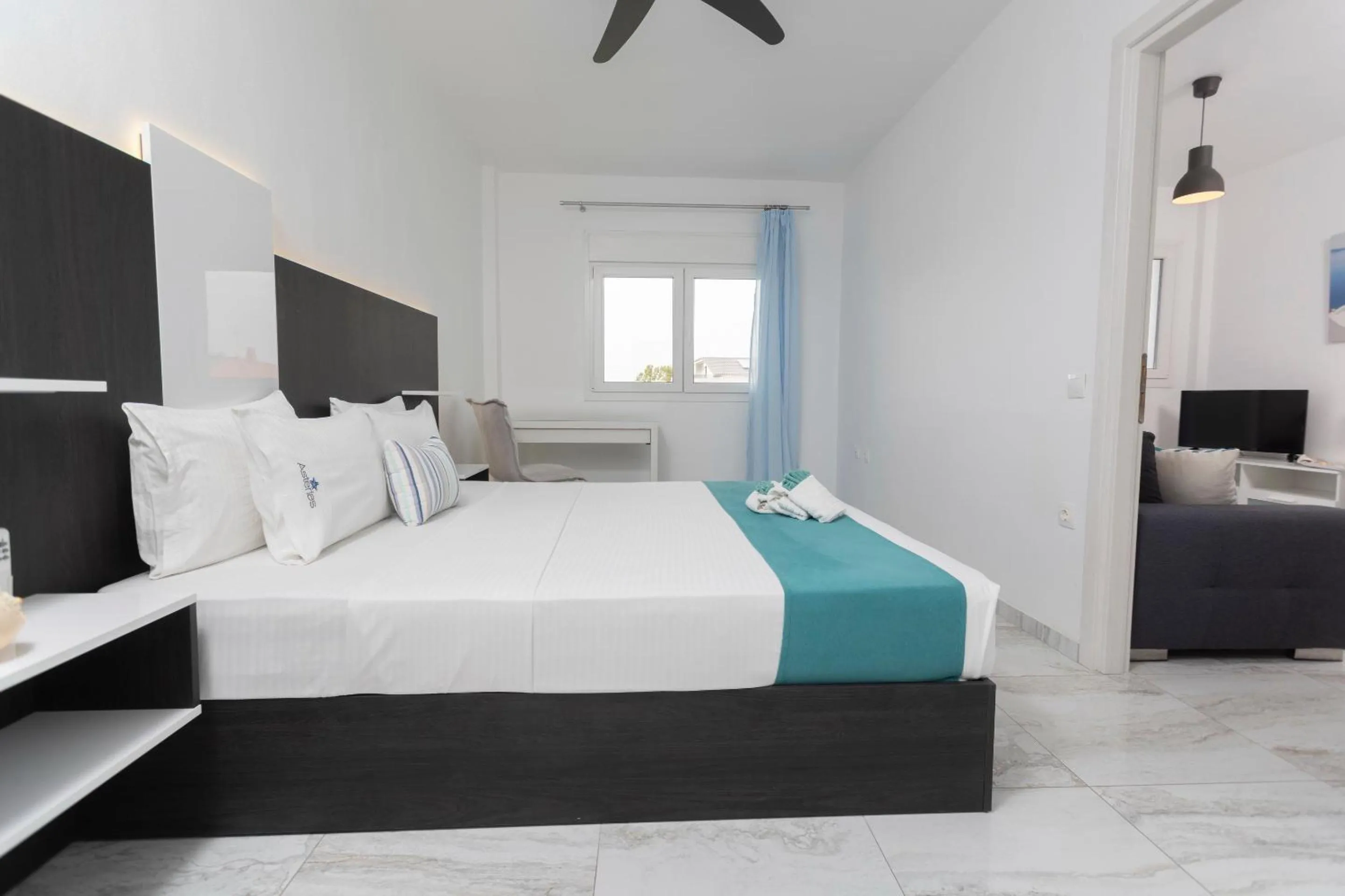 Bed in Asterias Premium Holiday Apartments