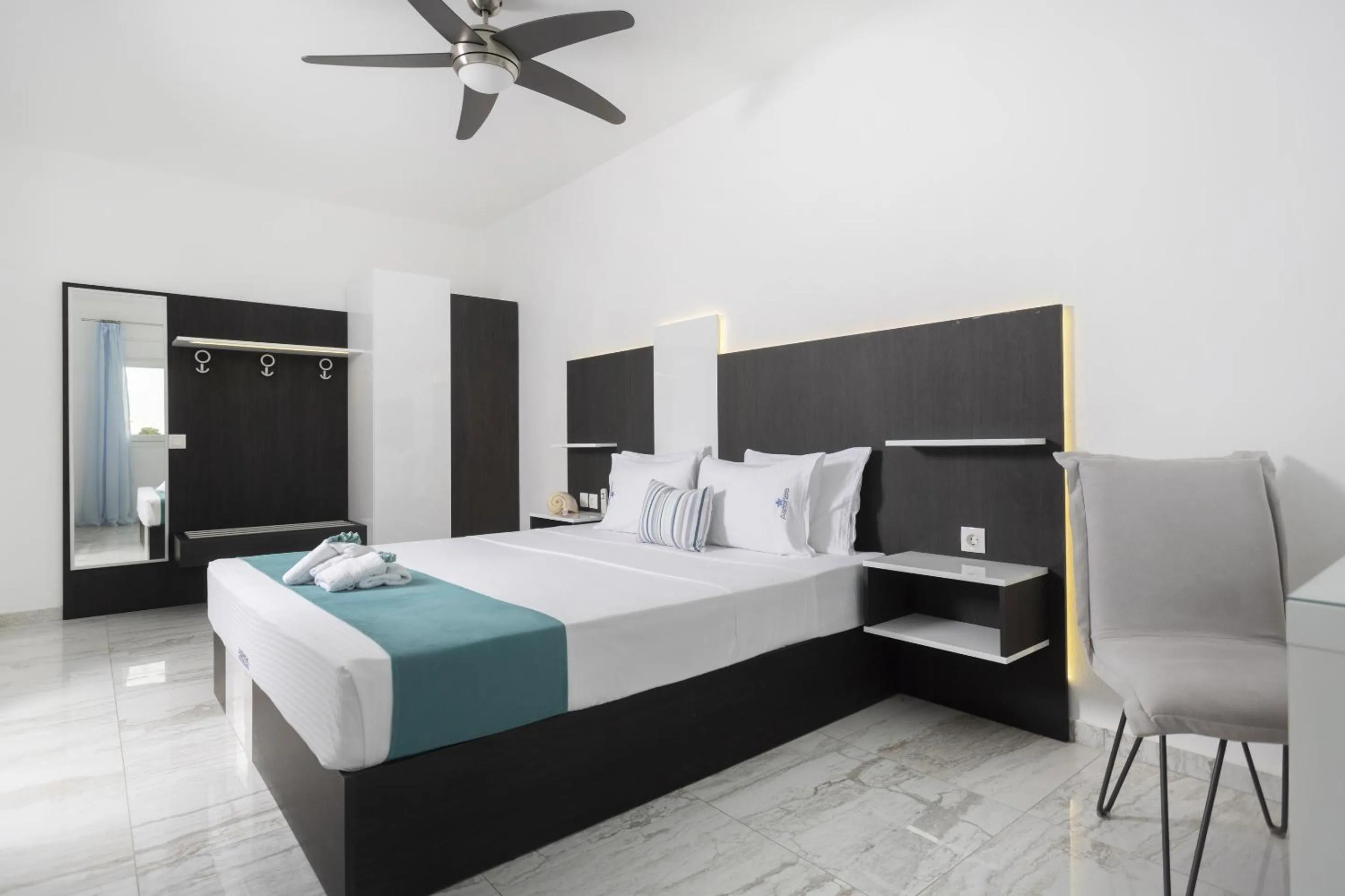 Bed in Asterias Premium Holiday Apartments