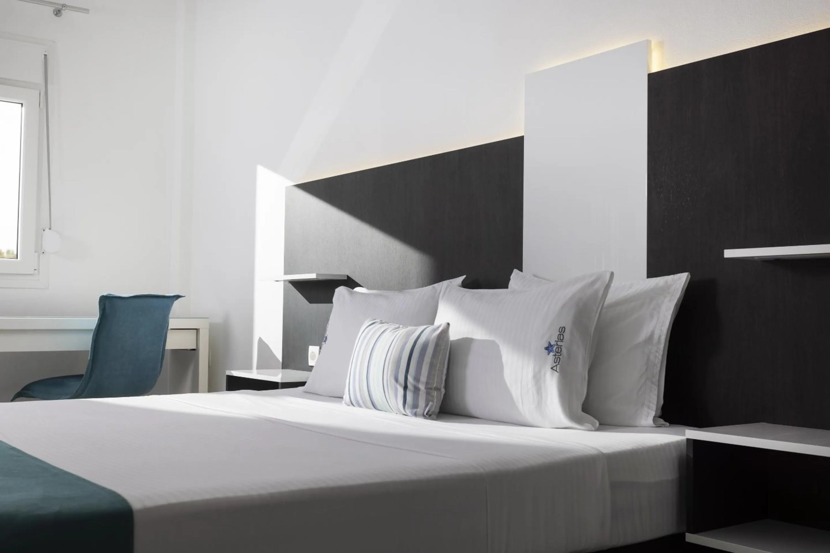Bed in Asterias Premium Holiday Apartments