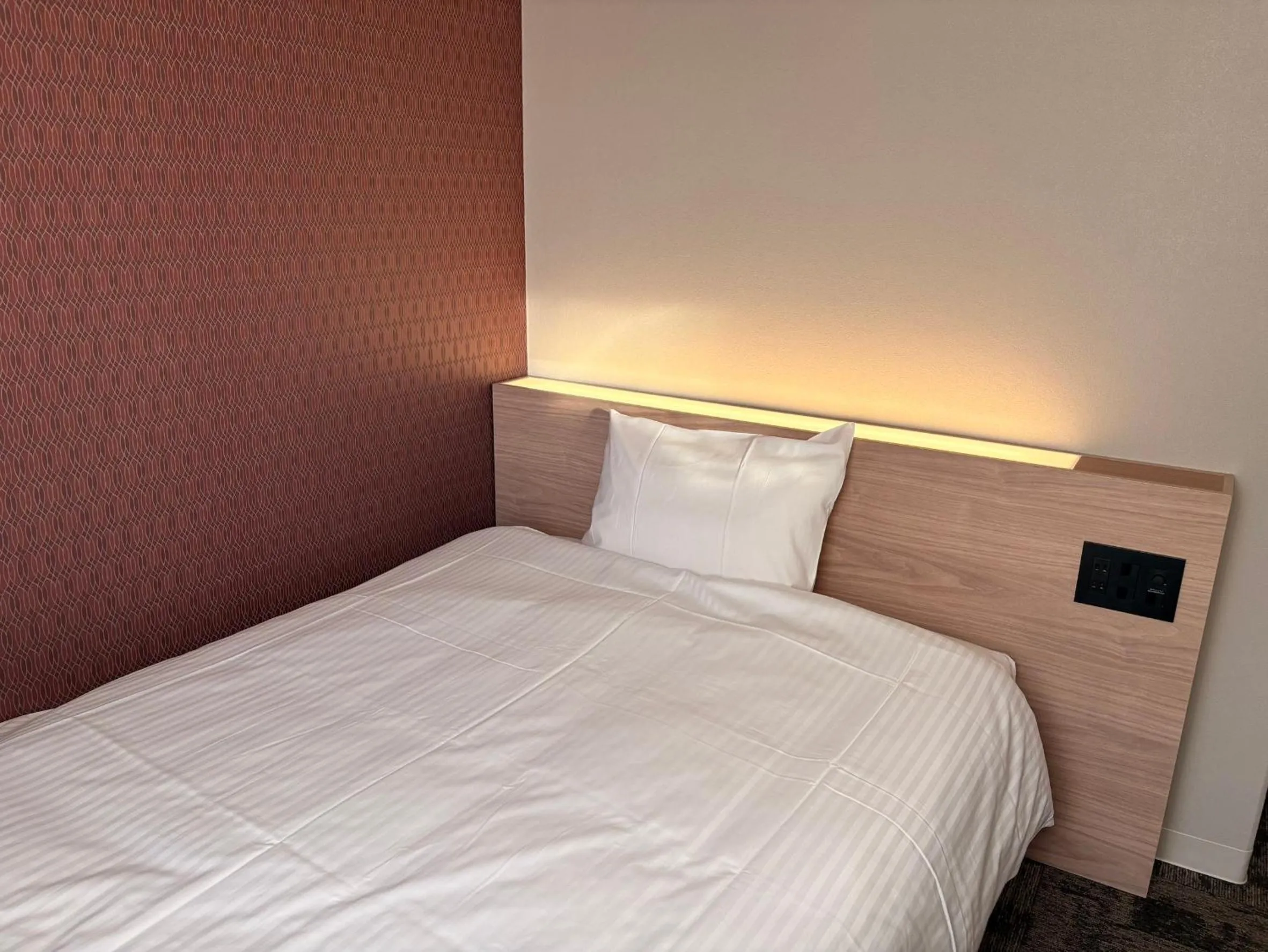 Photo of the whole room, Bed in Tabist Hotel Tetora Kitakyushu