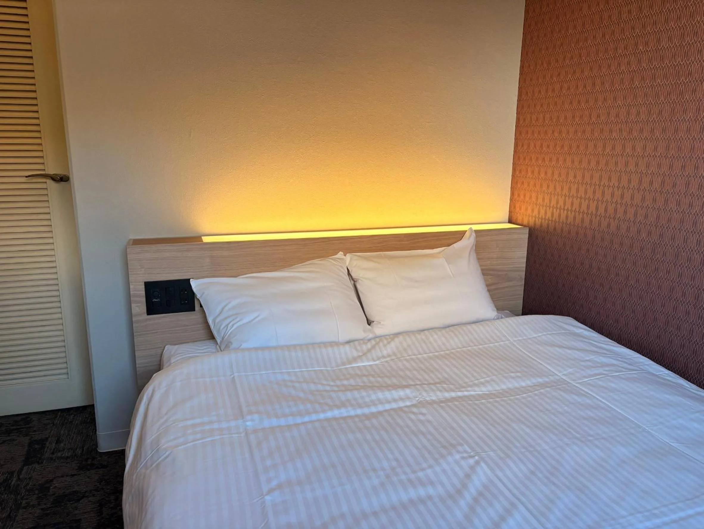 Photo of the whole room, Bed in Tabist Hotel Tetora Kitakyushu