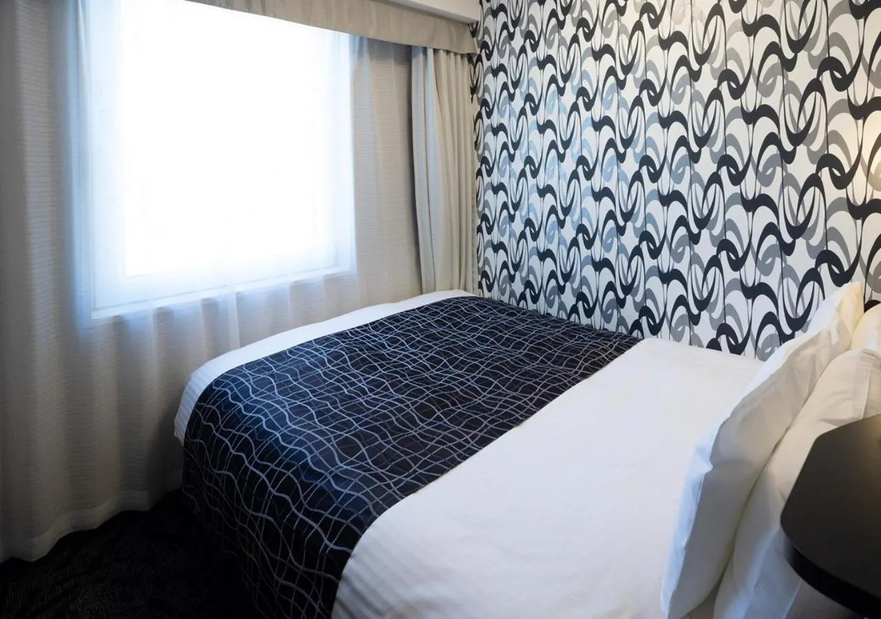 Photo of the whole room, Bed in APA Hotel Niigata Furumachi