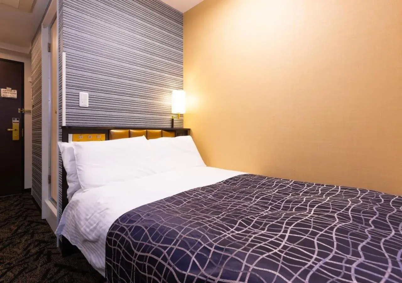 Photo of the whole room, Bed in APA Hotel Niigata Furumachi Photo of the whole room, Bed in APA Hotel Niigata Furumachi