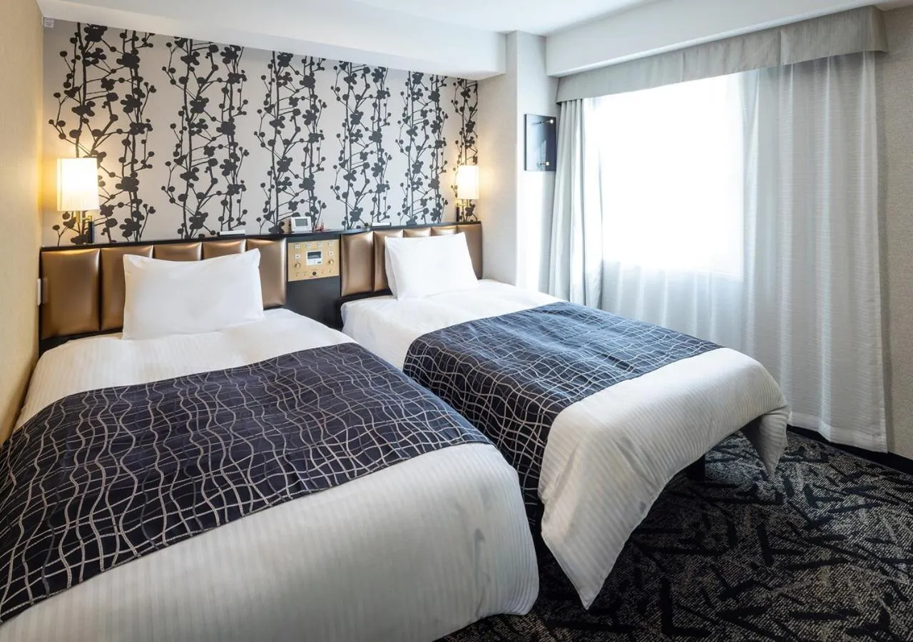 Photo of the whole room, Bed in APA Hotel Niigata Furumachi