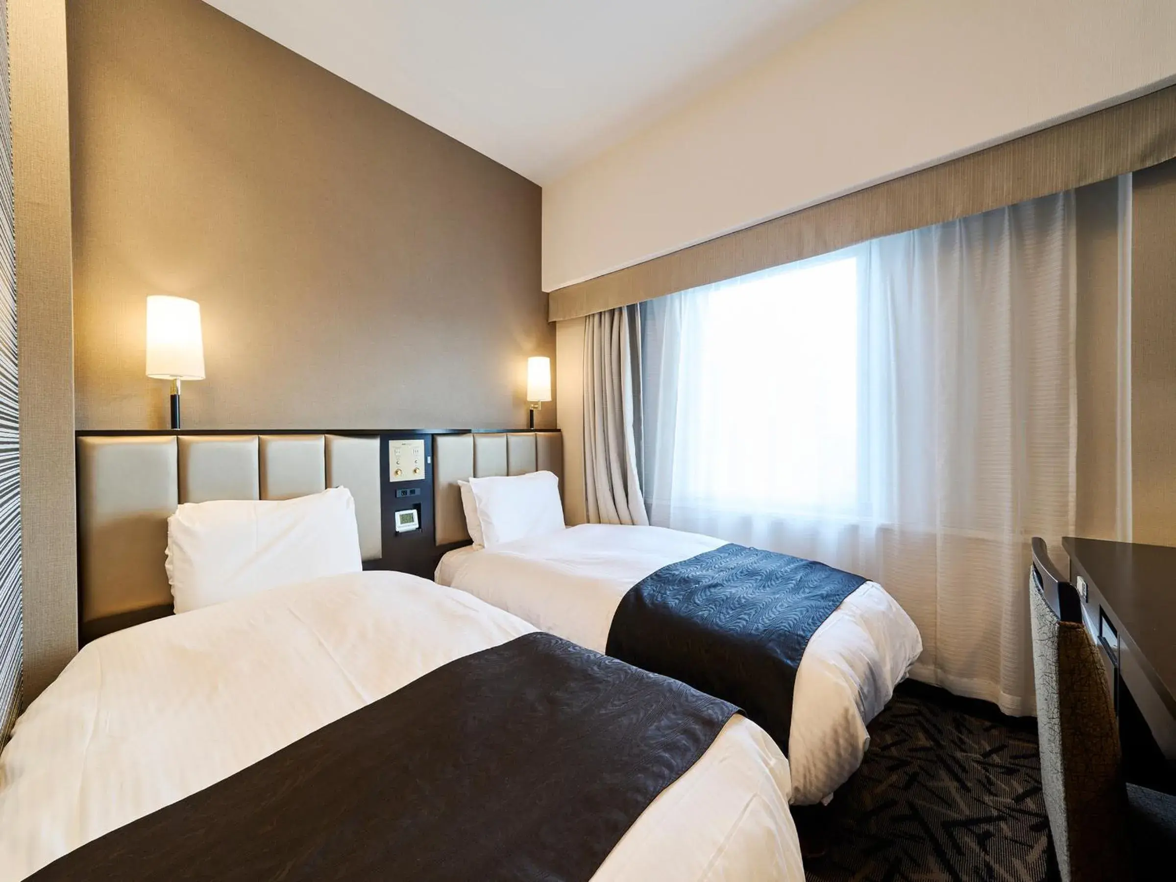 Bed in APA Hotel Takaoka Marunouchi Bed in APA Hotel Takaoka Marunouchi