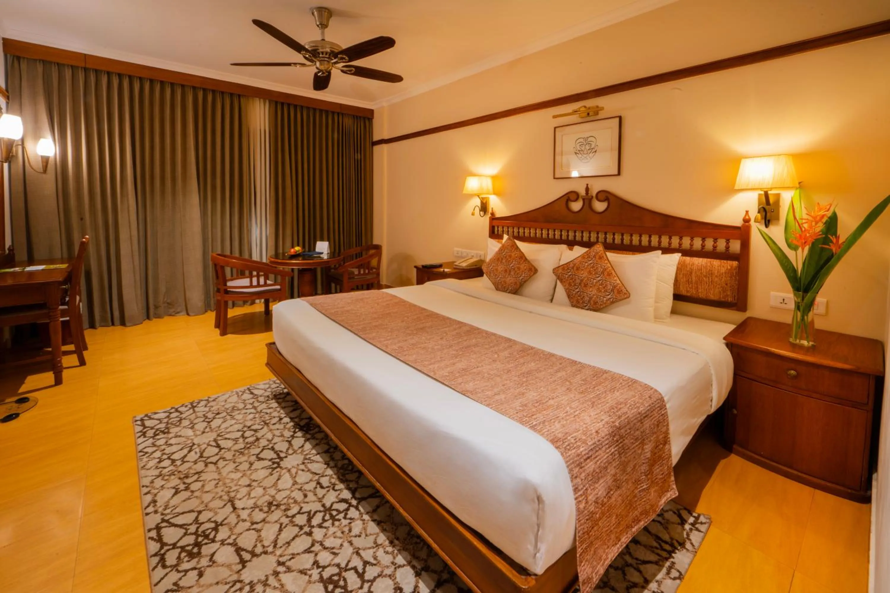 Seating area, Bed in The Raviz Kadavu, Kozhikode