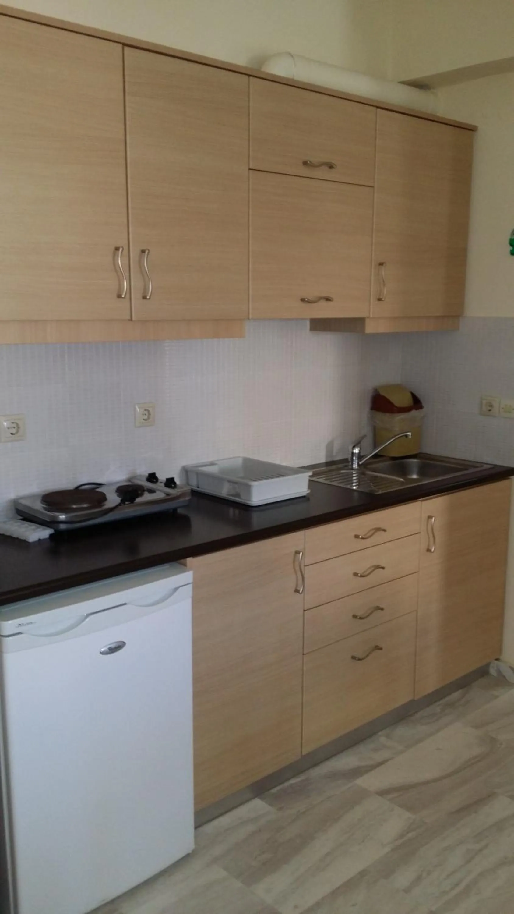 Kitchen or kitchenette in Mythos Beach Hotel Apartments