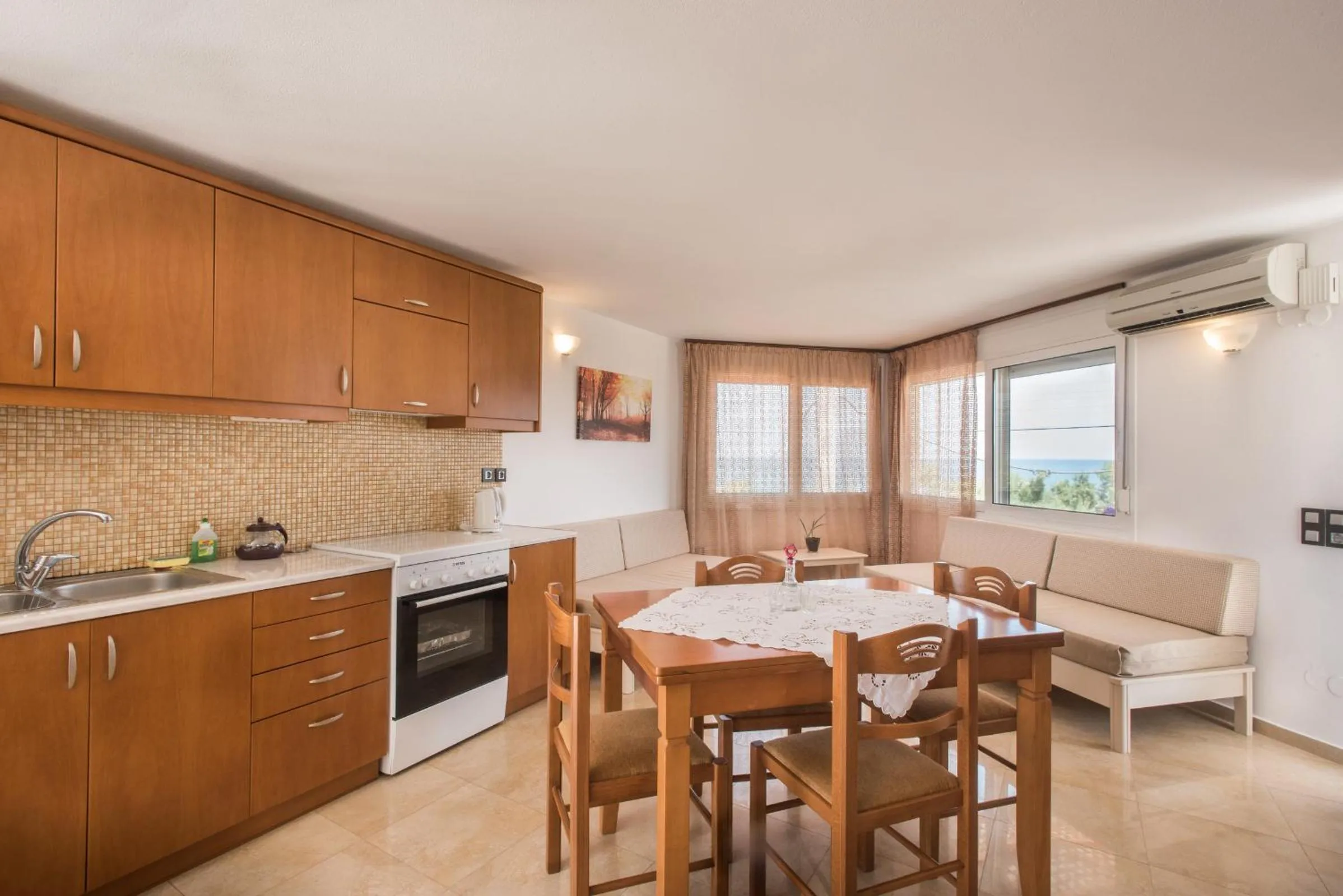 Dining area in Mythos Beach Hotel Apartments