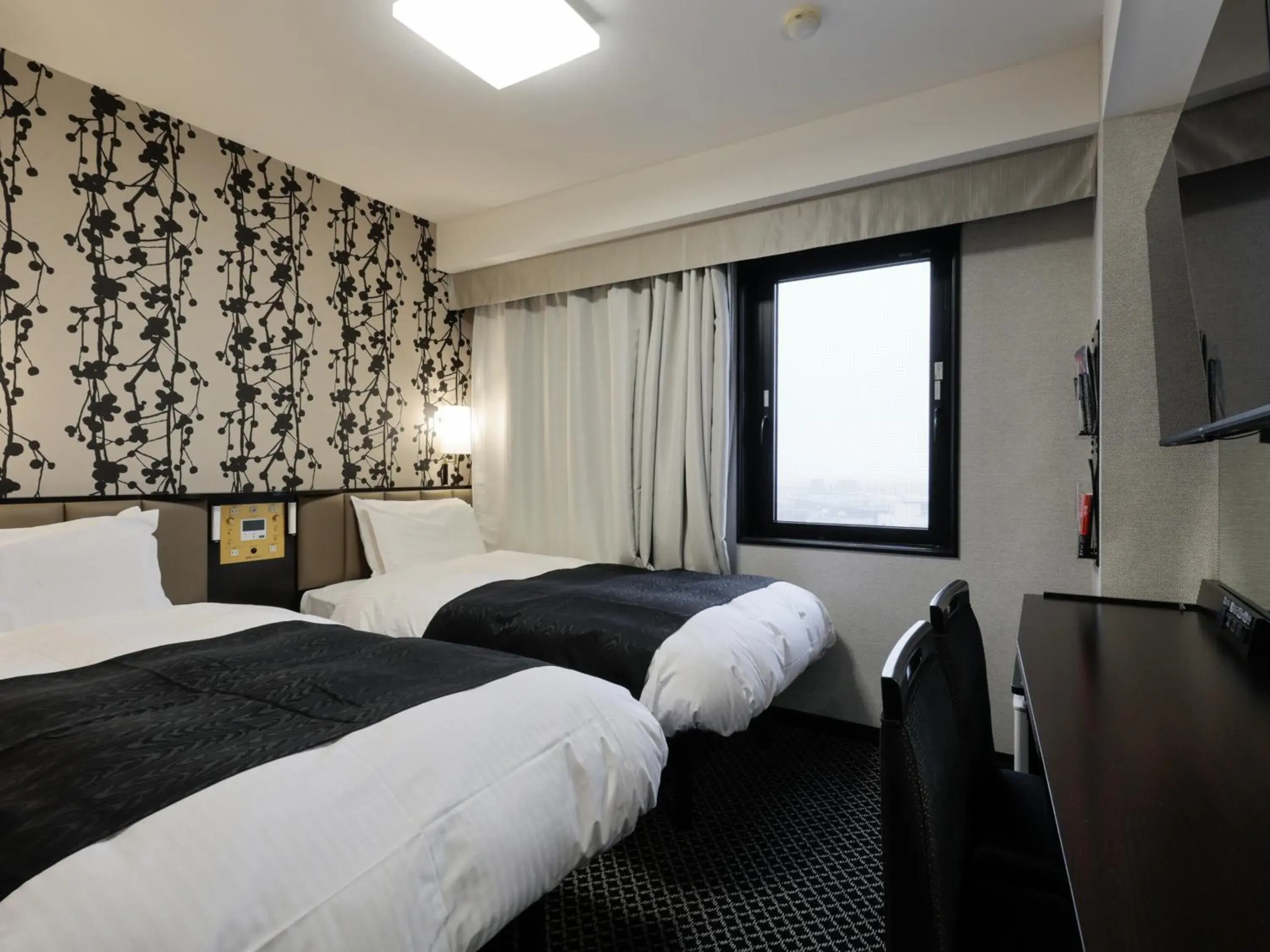 Photo of the whole room, Bed in APA Hotel Tonami Ekimae Photo of the whole room, Bed in APA Hotel Tonami Ekimae