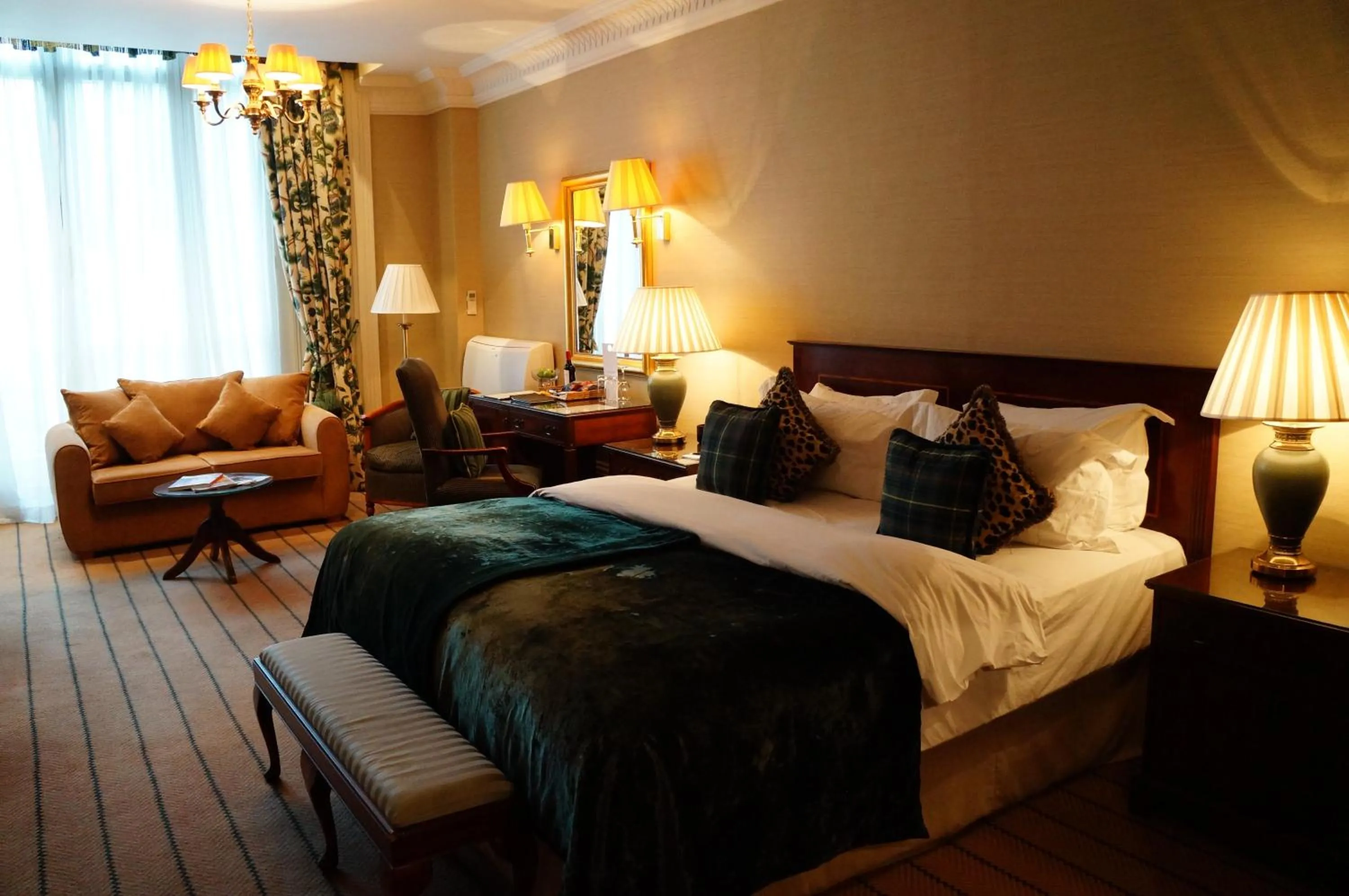 Photo of the whole room, Bed in The Colonnade