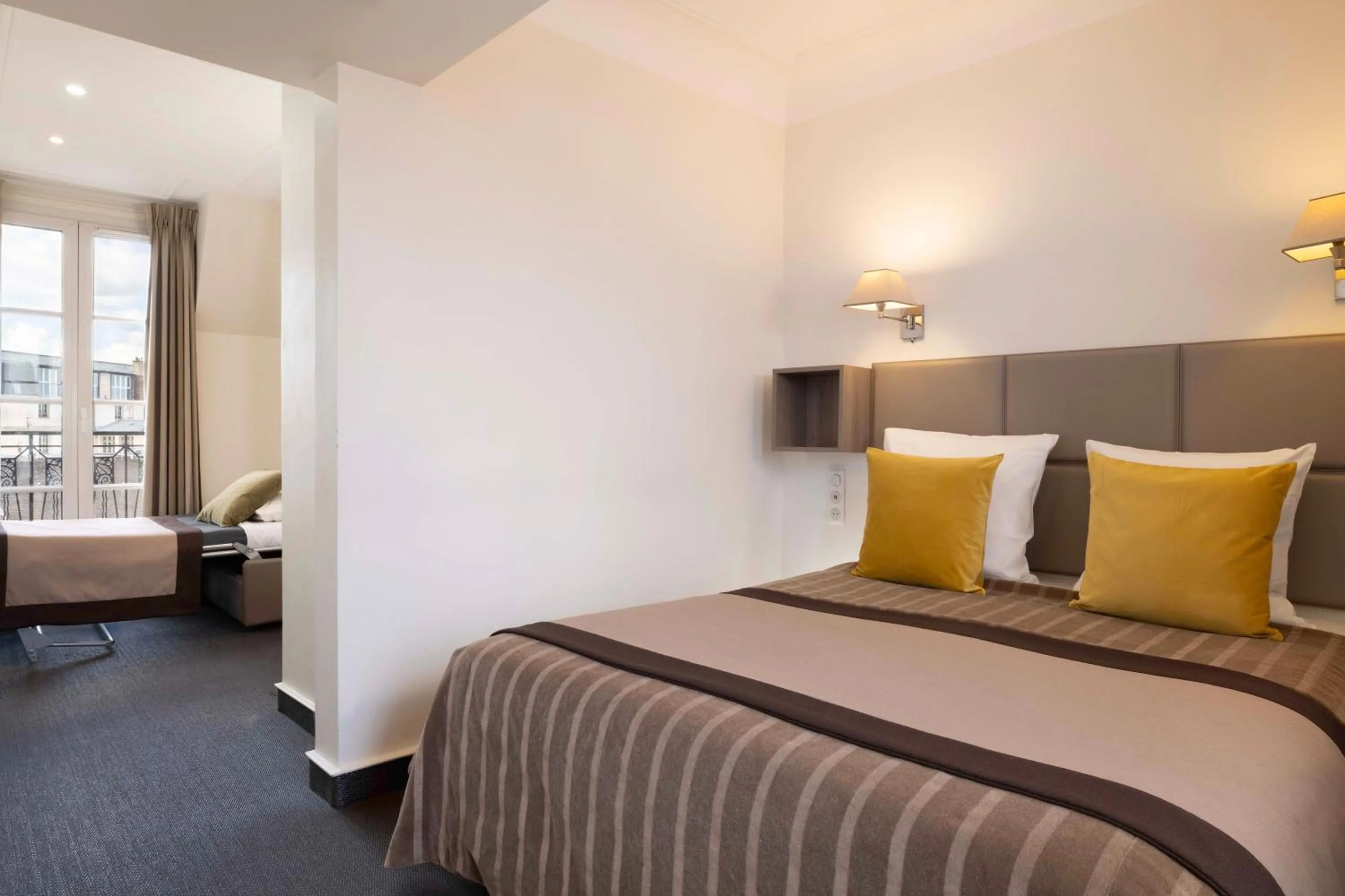 Photo of the whole room, Bed in Hôtel Saint Pierre