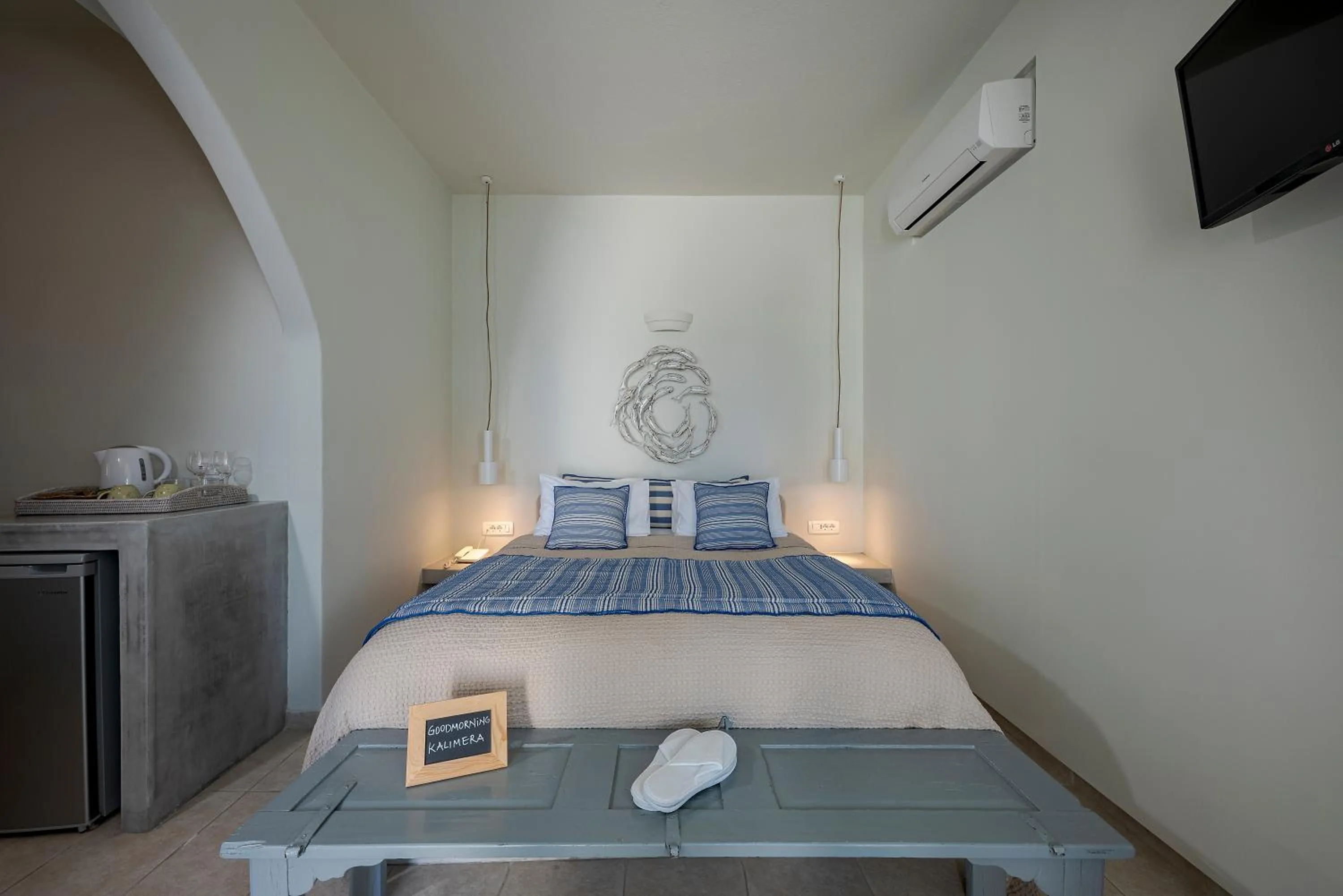 Bed in Blue Dolphins Apartments