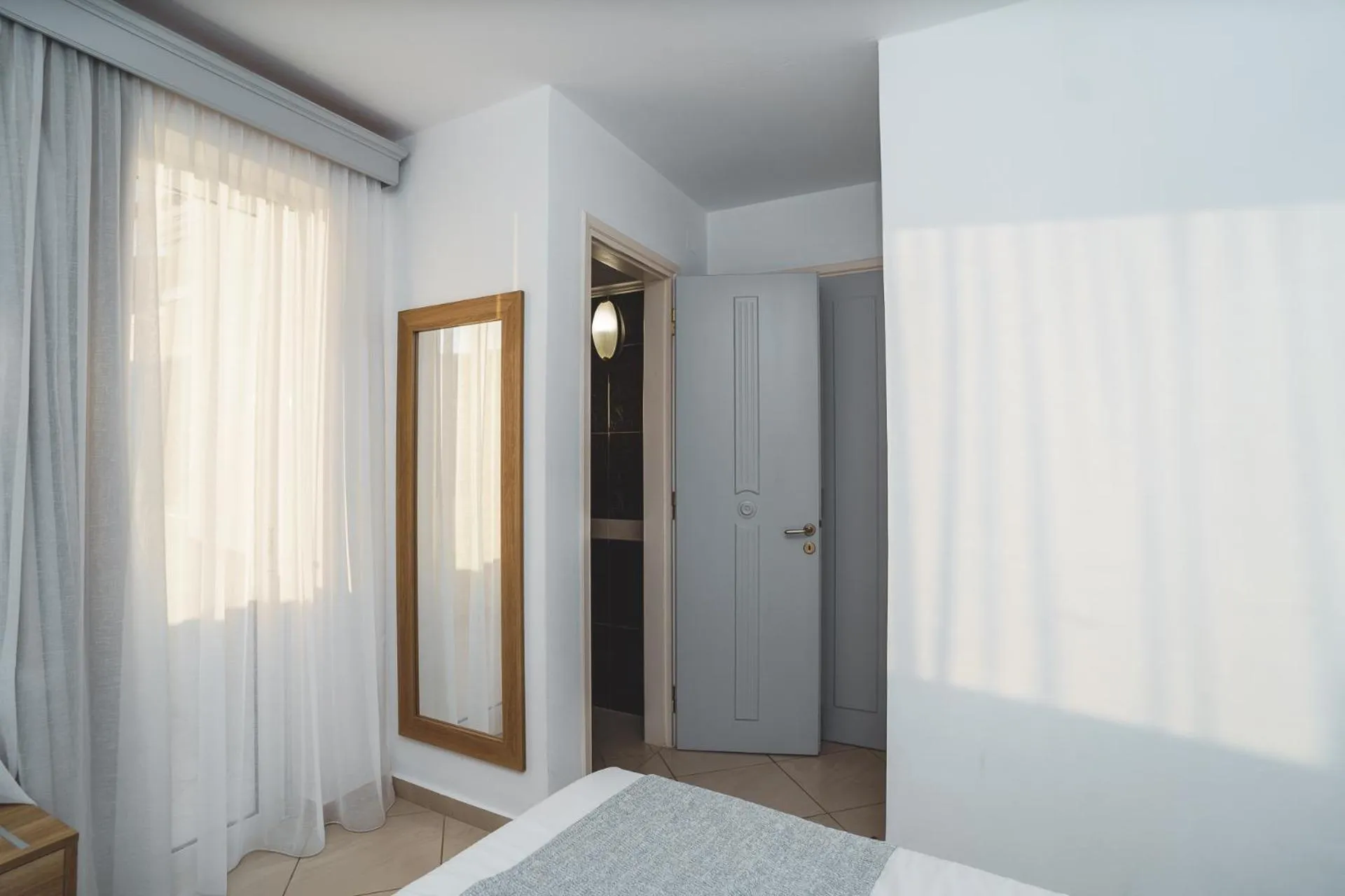 Bed in Zeus Village Resort - Adults Only