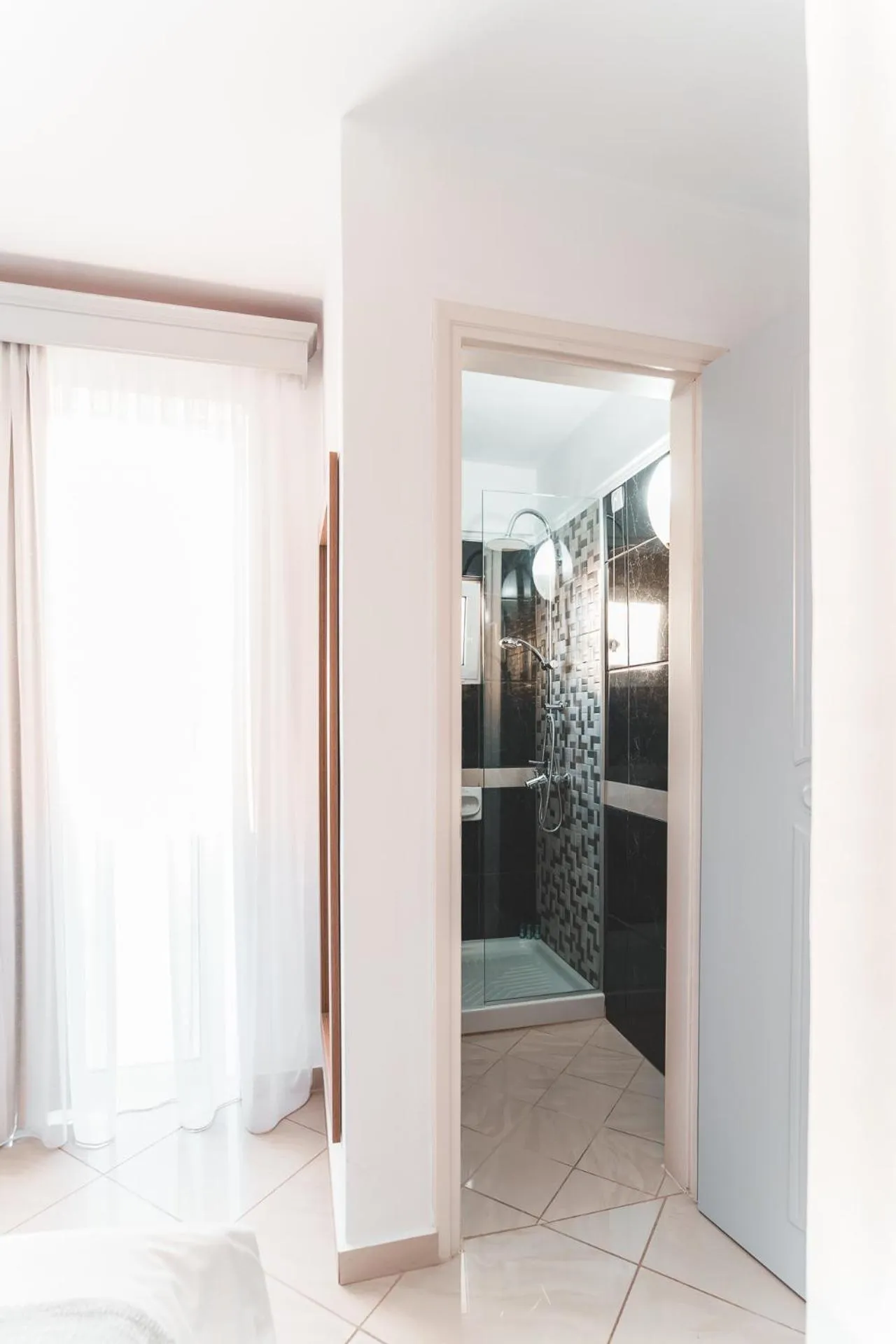 Shower in Zeus Village Resort - Adults Only