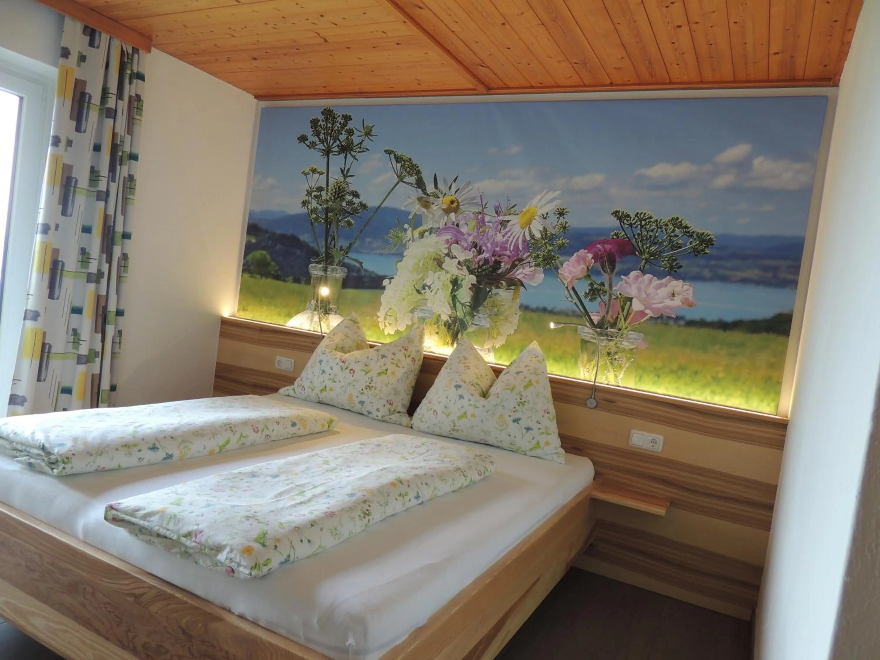 Bed in Ferienwohnungen Schöbringer