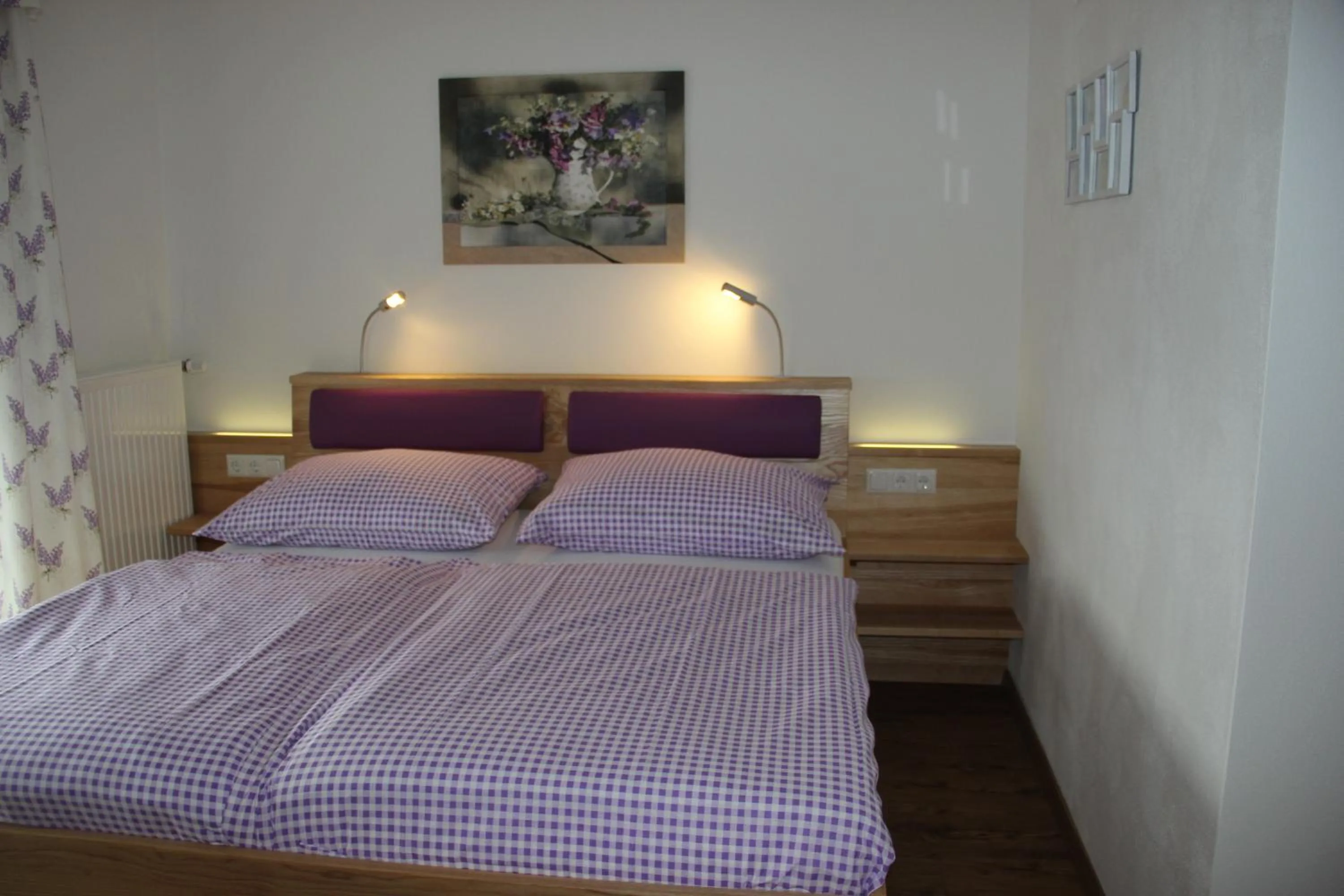 Bed in Ferienwohnungen Schöbringer