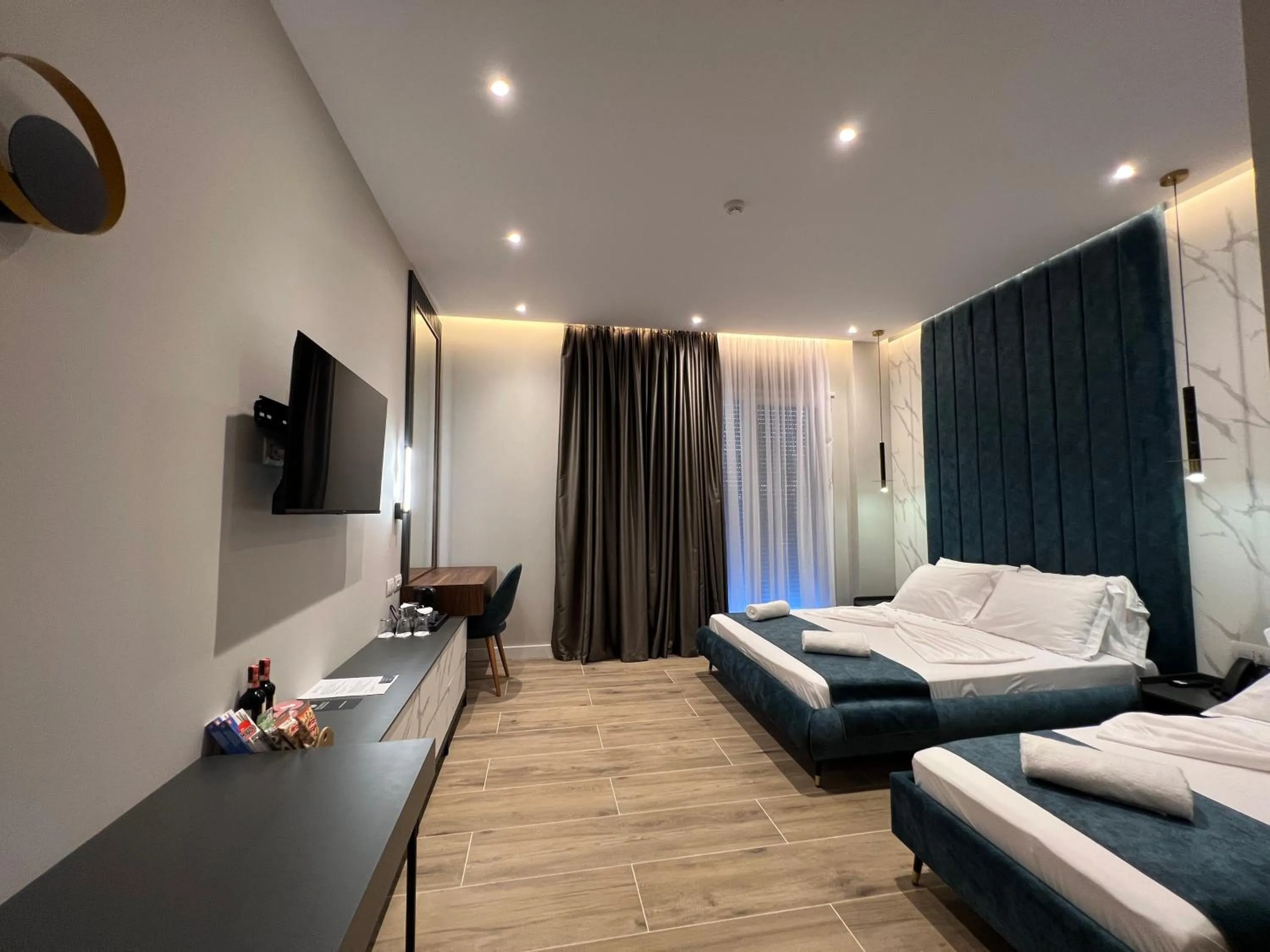 Luxury Triple Room in Domus Hotel & Apartments