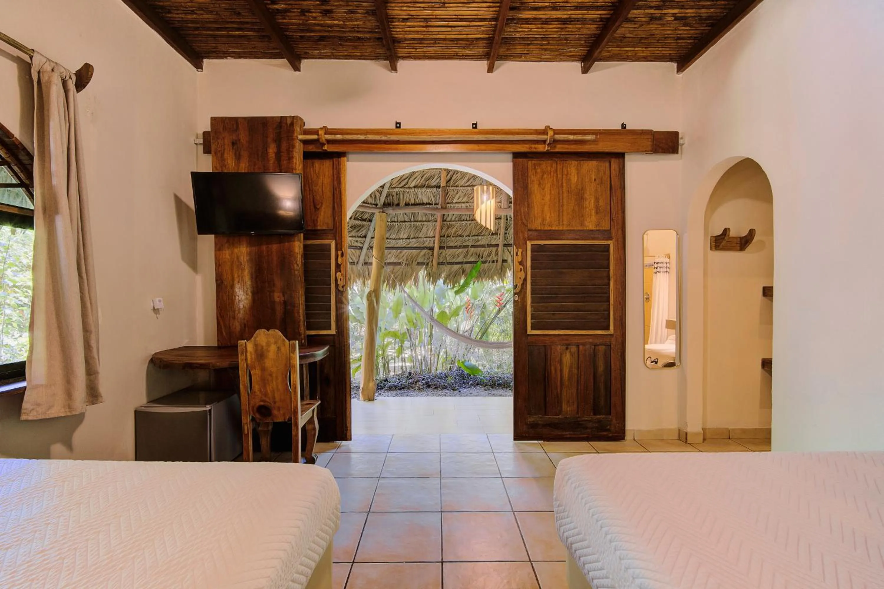 Bed in Cariblue Beach and Jungle Resort