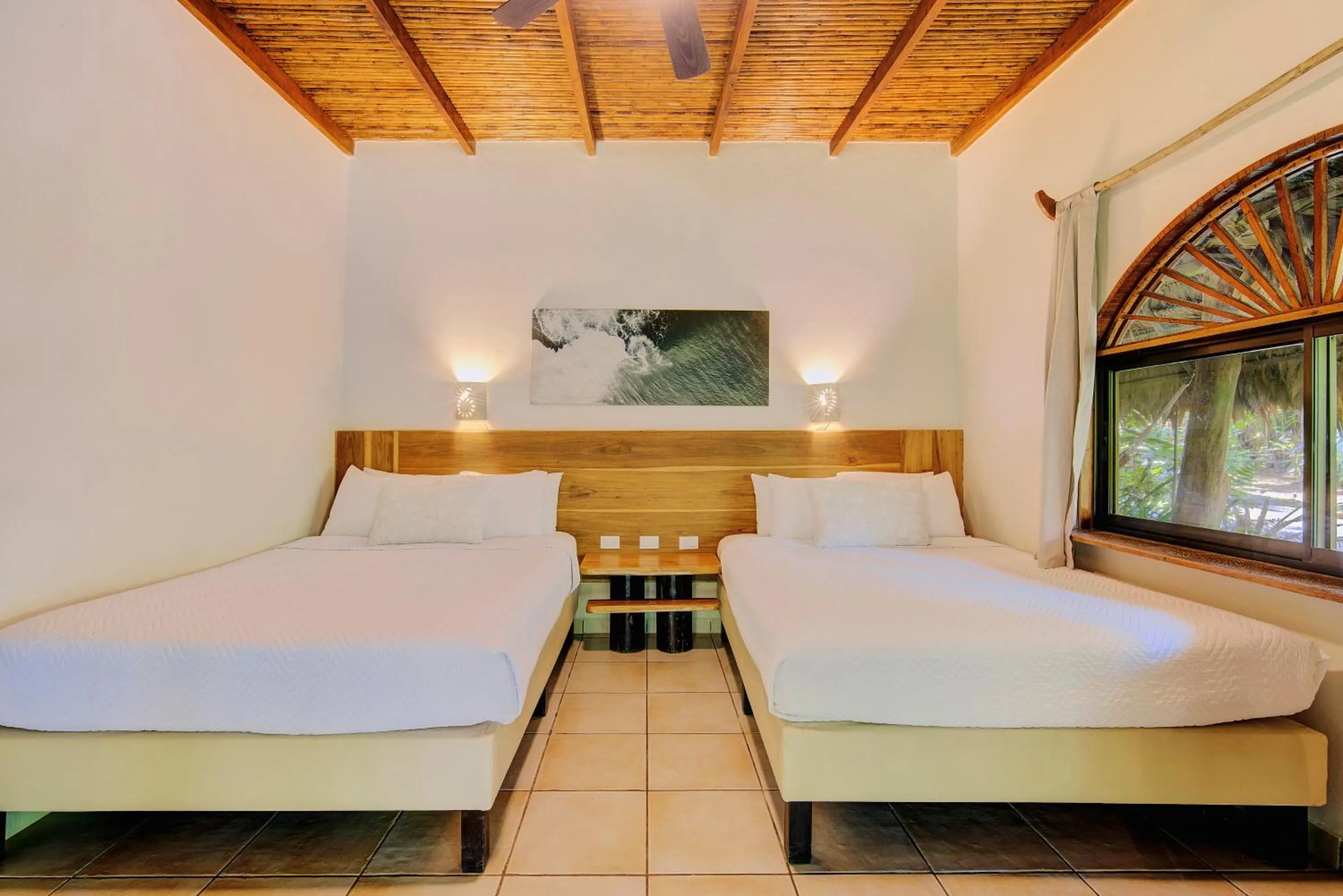 Bed in Cariblue Beach and Jungle Resort