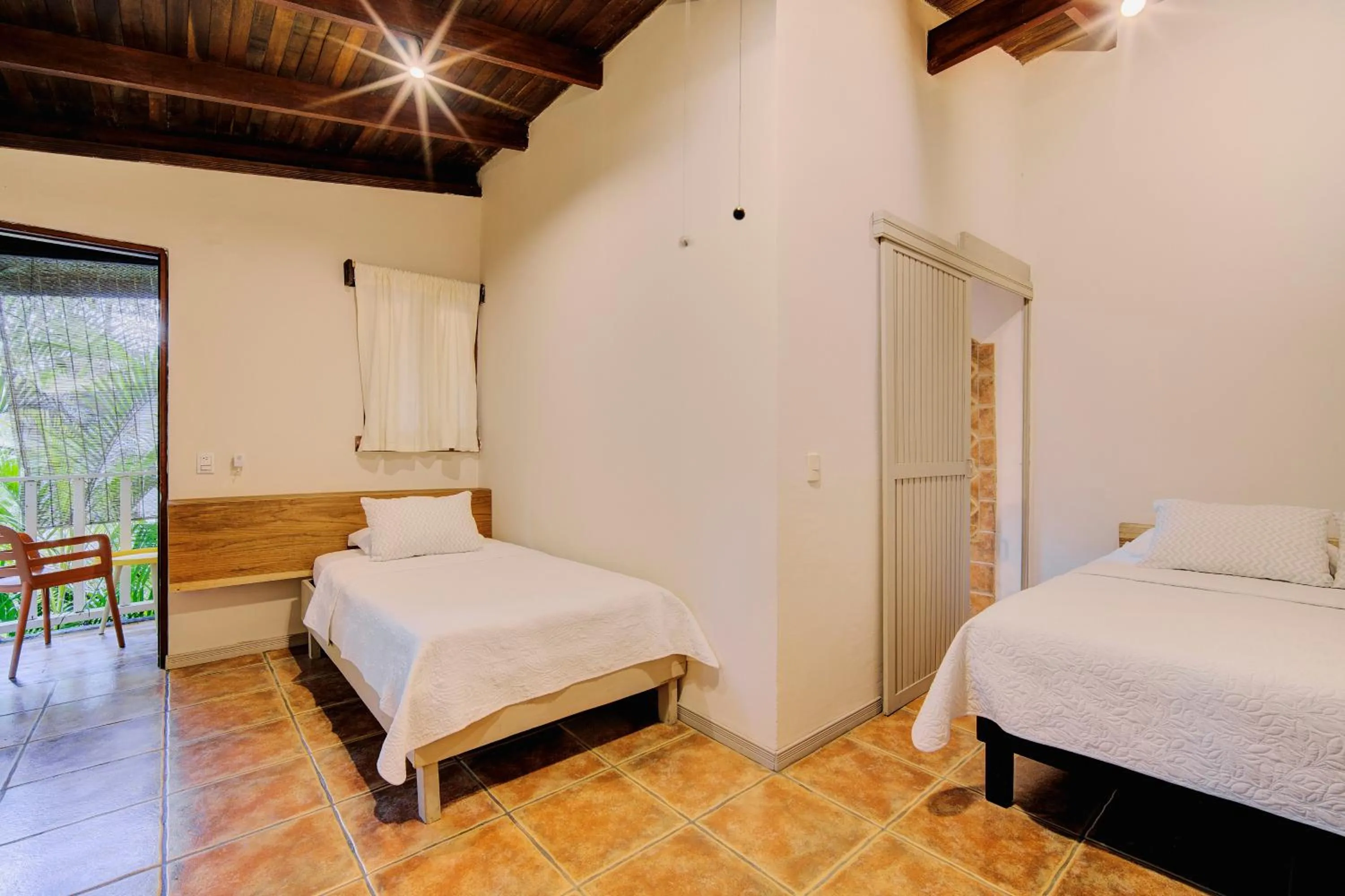 Bed in Cariblue Beach and Jungle Resort