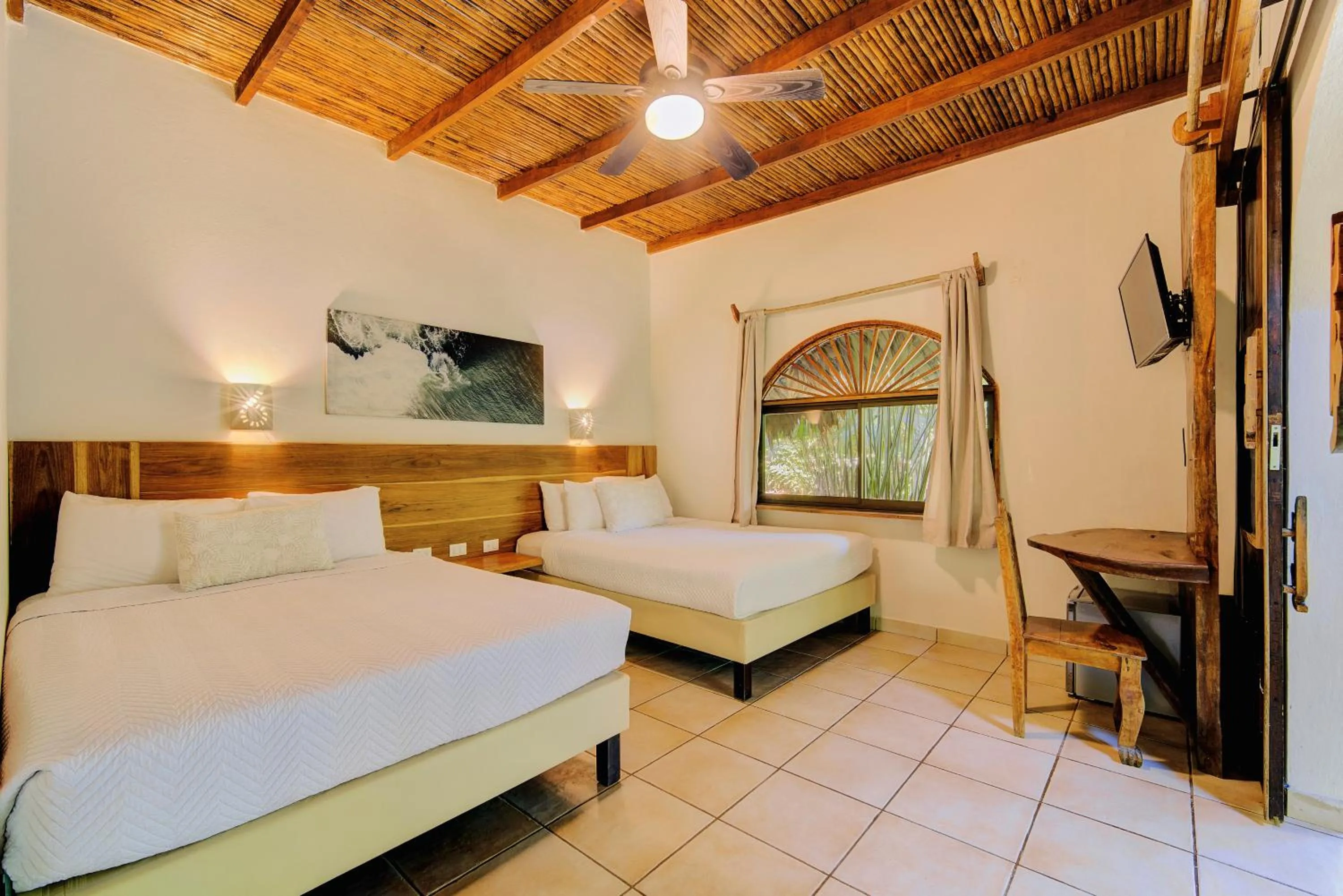 Bed in Cariblue Beach and Jungle Resort